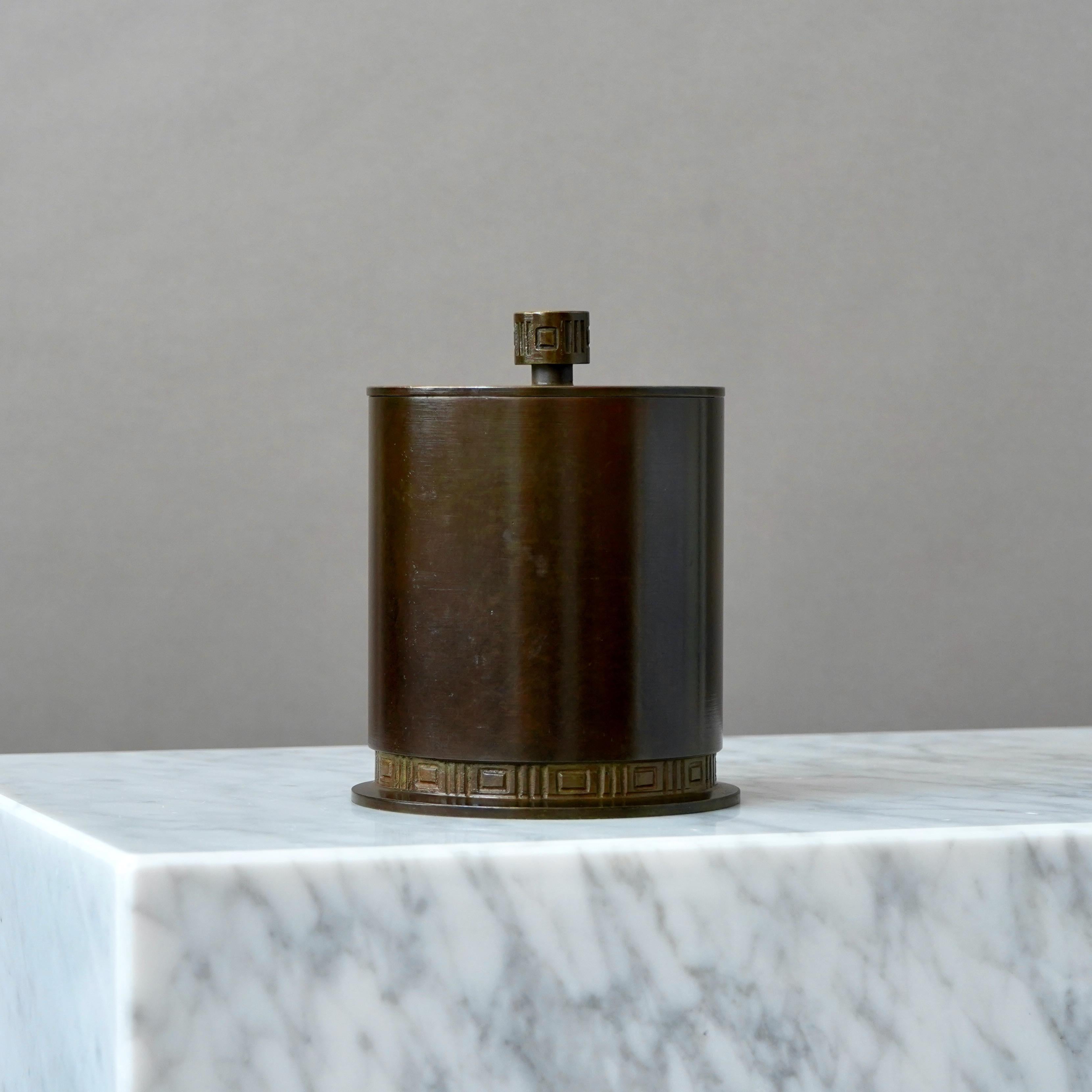 A beautiful lidded bronze box with amazing patina. The inside clad in teak wood. 
Made by GAB Guldsmedsaktiebolaget, Sweden, 1930s.  

Great condition, with only a few light scratches. 
Stamped 'BRONS' and makers mark.