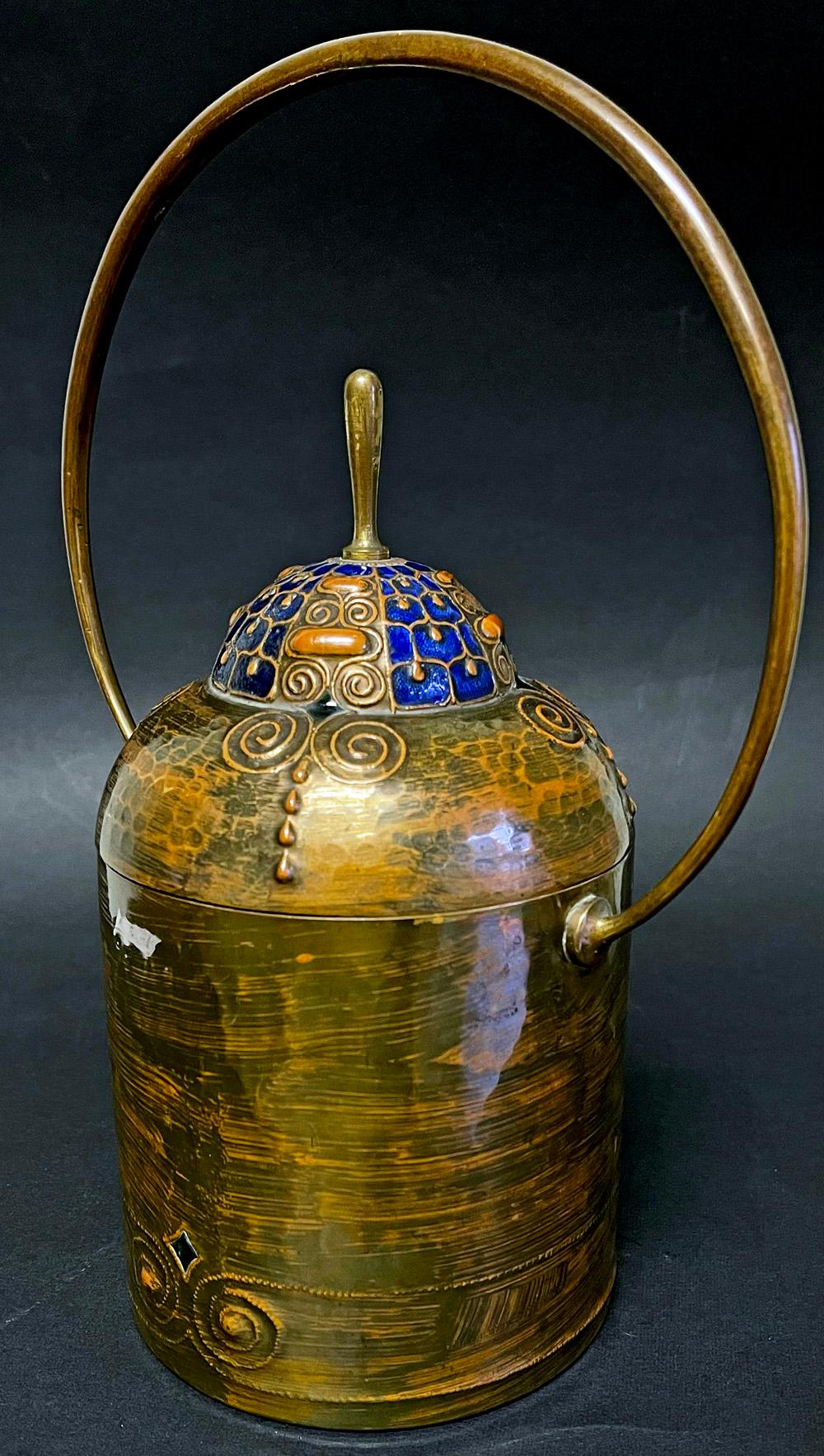 Crafted by Ludwig Vierthaler for the Josef Winhart metalwork company in Munich, this gorgeous and singular lidded canister displays the bravura repoussé work that the artist is known for. Winhart hammered elaborate Secession-style swirls and