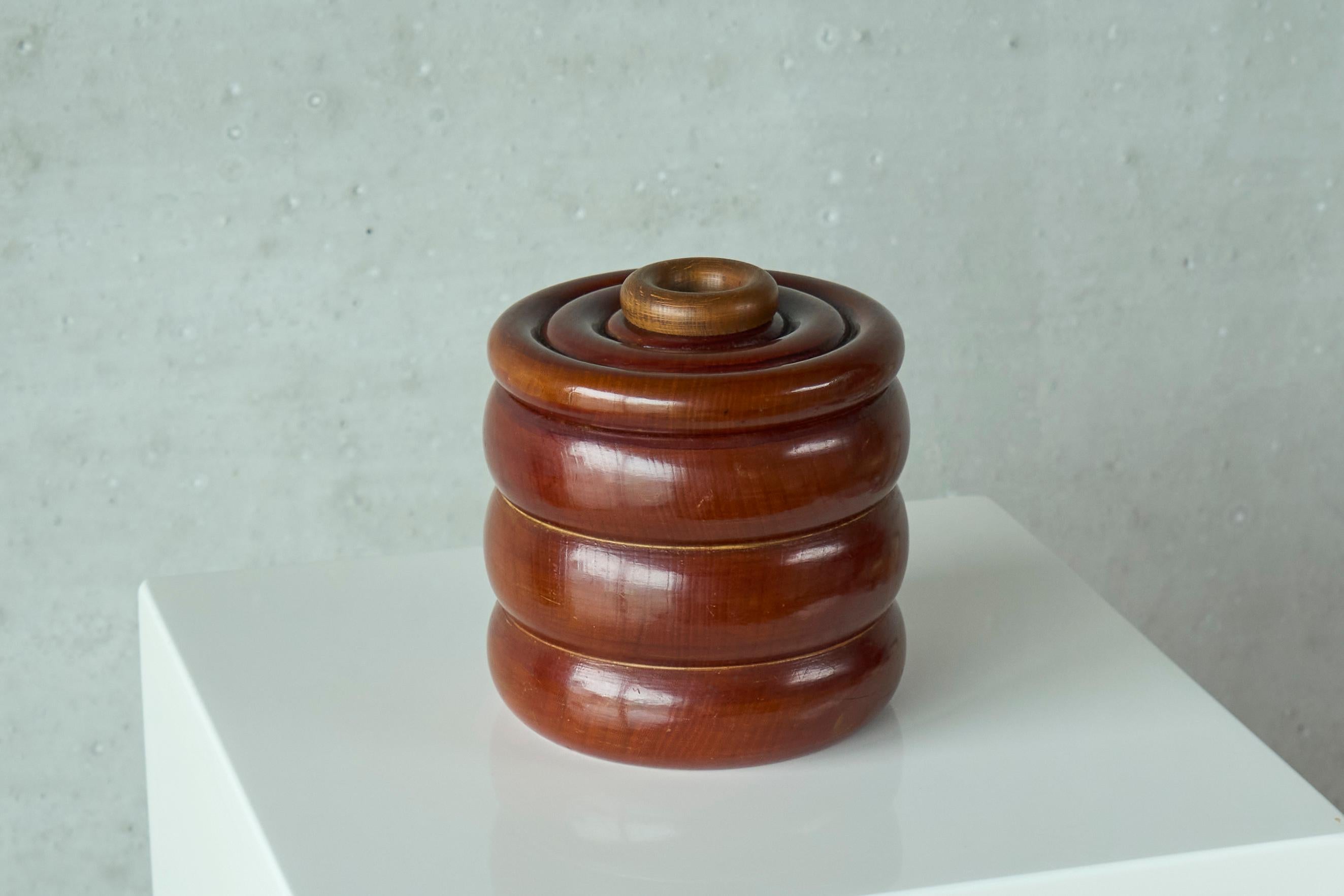 Lidded Pot in Wood, Europe, 1950s.

Wonderful lidded pot in solid turned wood. Great design with rings all over - even the handle on the lid is a ring itself. Would be wonderful as a practical item in you kitchen, or can also be used as a catchall