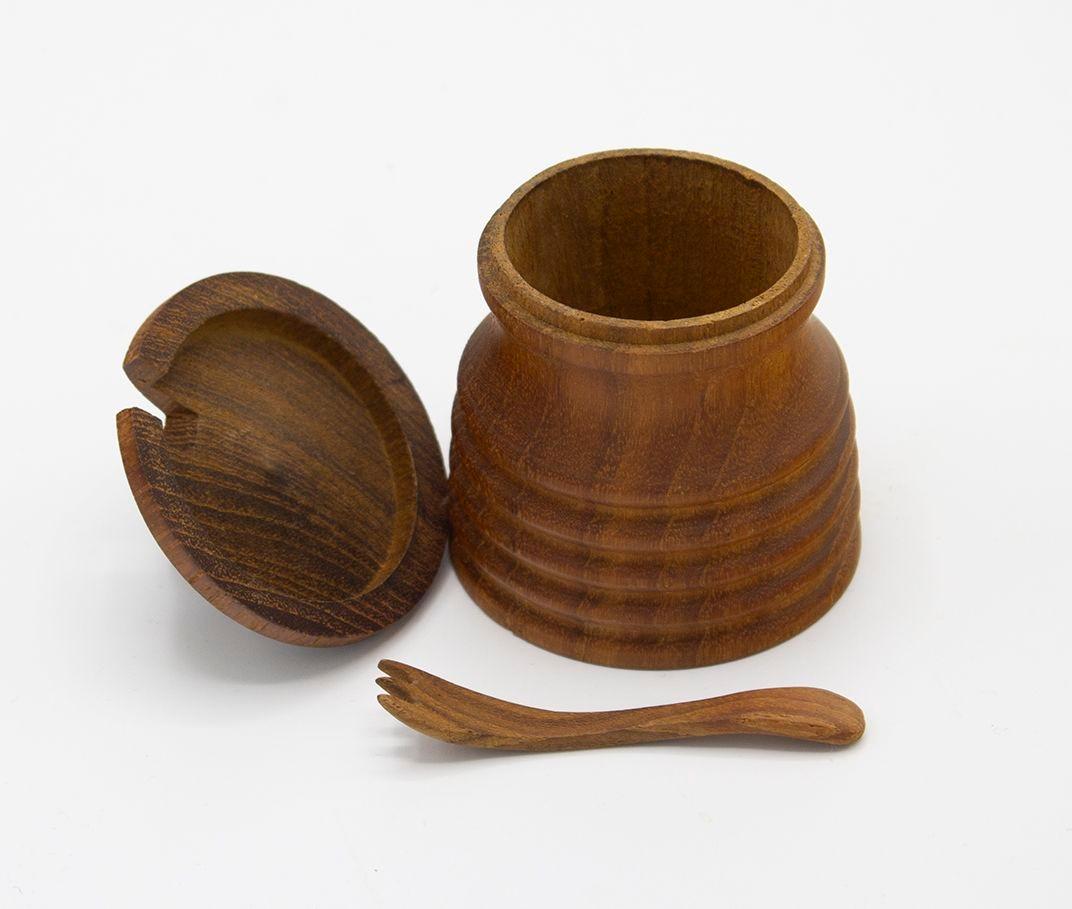 Likely Thailand or Scandinavian, 1960s
Vintage lidded jar in solid teak, petite, looks like it was intended for use as a salt cellar, for peppercorns, or other spices. Includes turned jar, lid, and teak fork. Beautiful little piece for use or