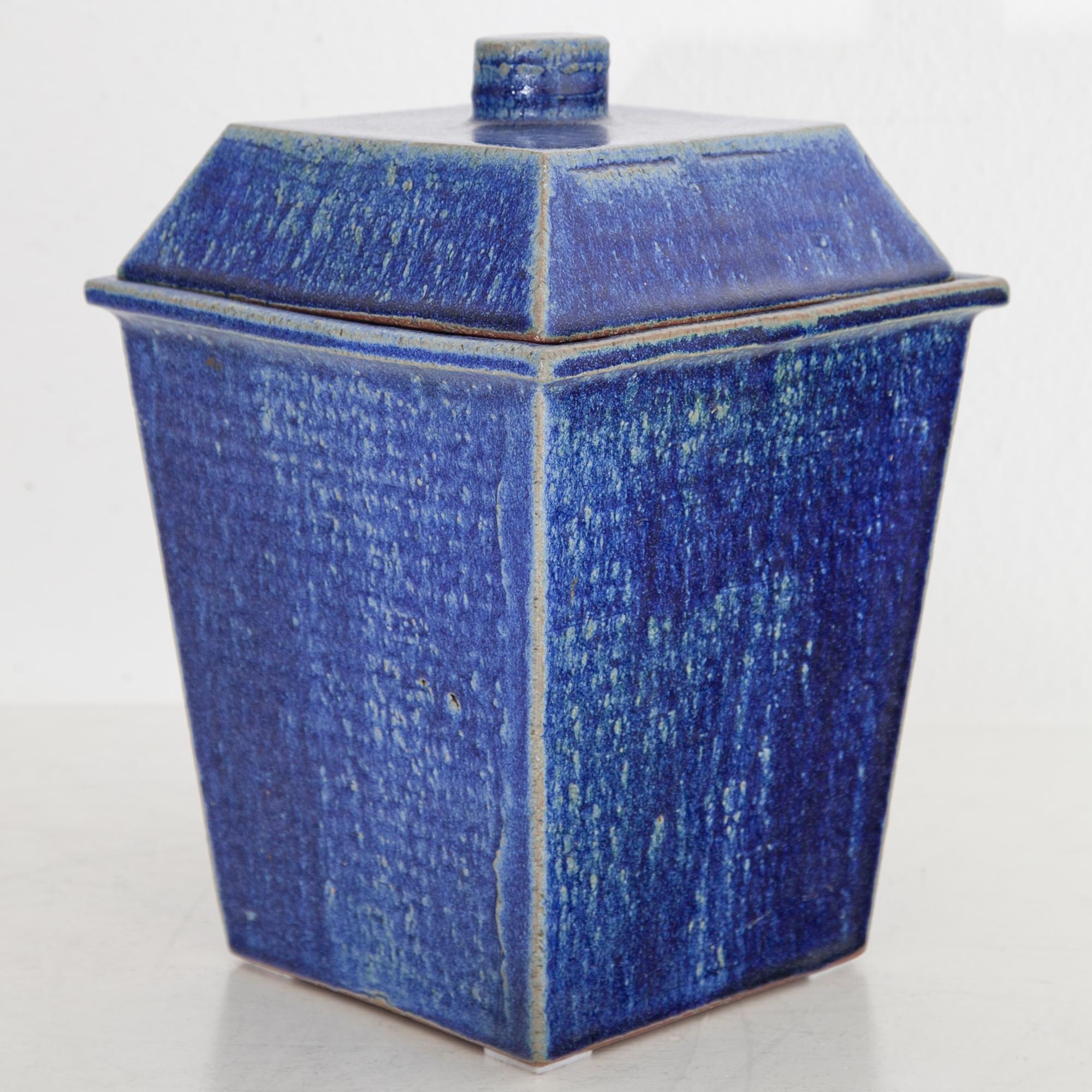 Blue glazed ceramic lidded vase with a square base shape by Franz Joseph Altenburg (born 1941). Stamped at the bottom with a three point signet, FJ as well as 96.