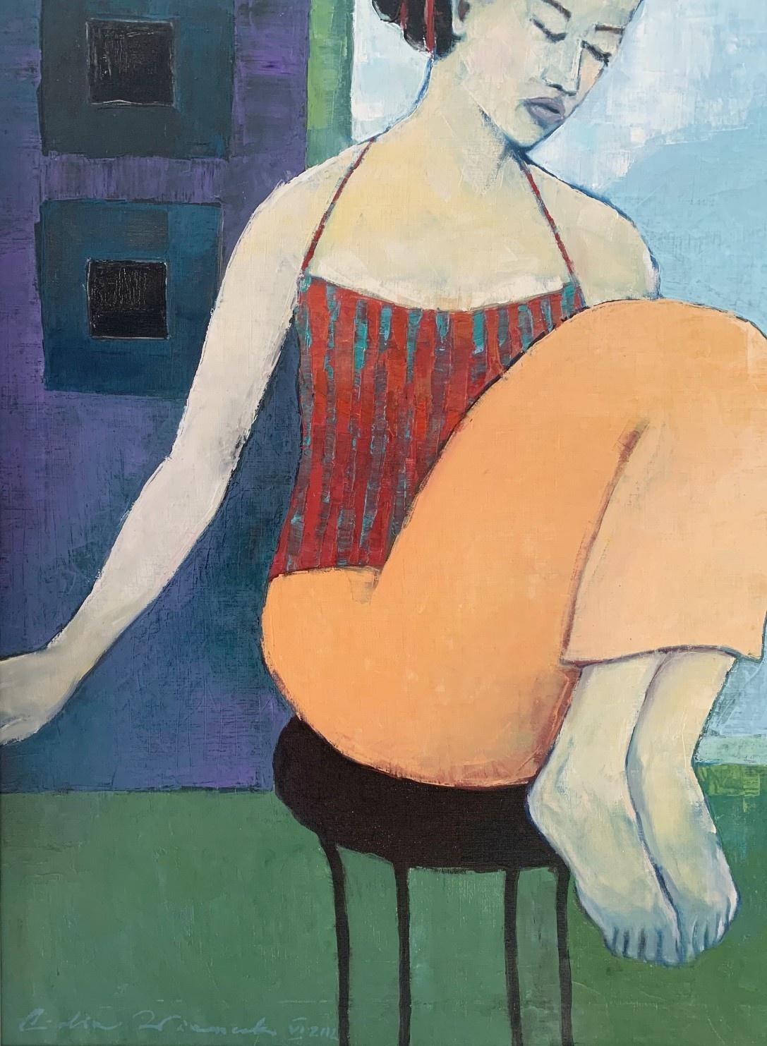 woman in a chair painting