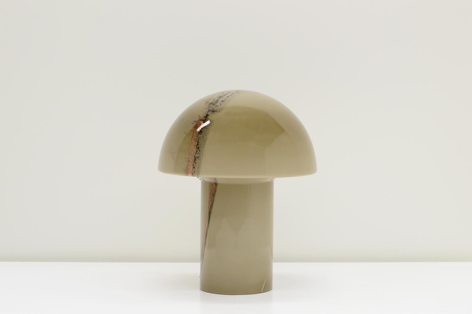 “Lido” mushroom table lamp by Peill & Putzler, Germany 70s. This is the largest version of 3. Hand blown brown/grey glass with red and black striping. This is a rare color. Holds a E27 buld. Marked on the inside. In very good vintage condition.