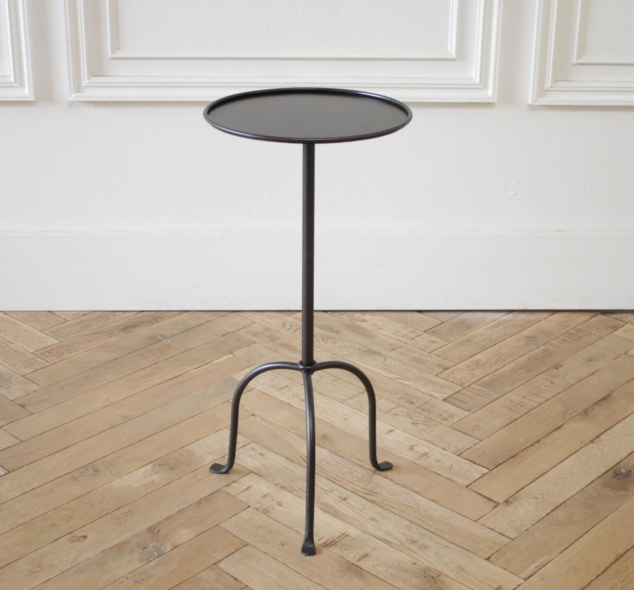 Lido tall iron drink table in iron finish or brass finish
Inspired by the antique version, this tall drink table is forged iron with a small round table top. Offered in either the dark iron finish, or antique brass colored finish.
Made in the USA,