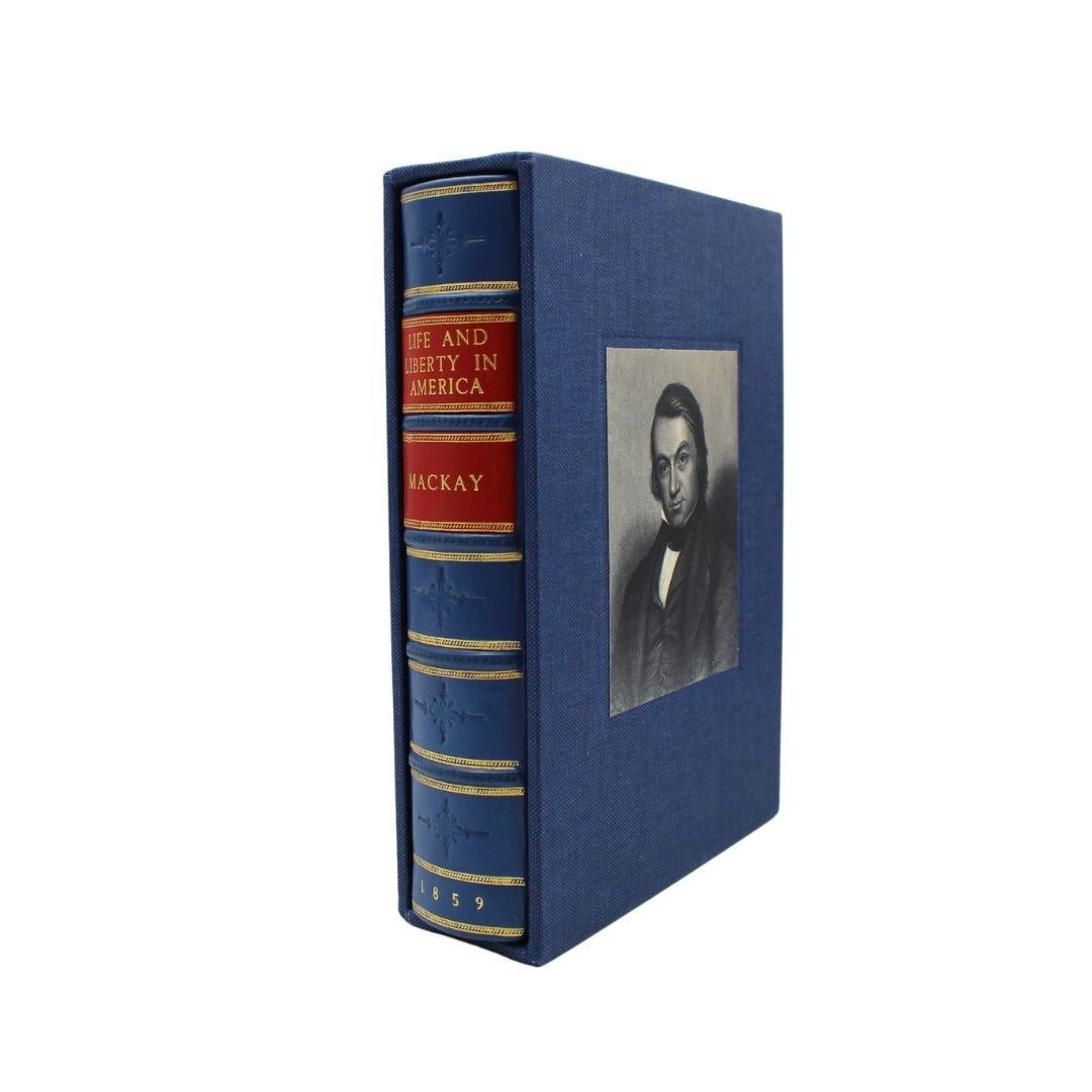 Mackay, Charles. Life and Liberty in America: or, Sketches of a Tour in the United States and Canada, in 1857-8. New York: Harper & Brothers, 1859. Octavo. Illustrated with ten engravings. Rebound in 1/4 blue leather and cloth boards with raised