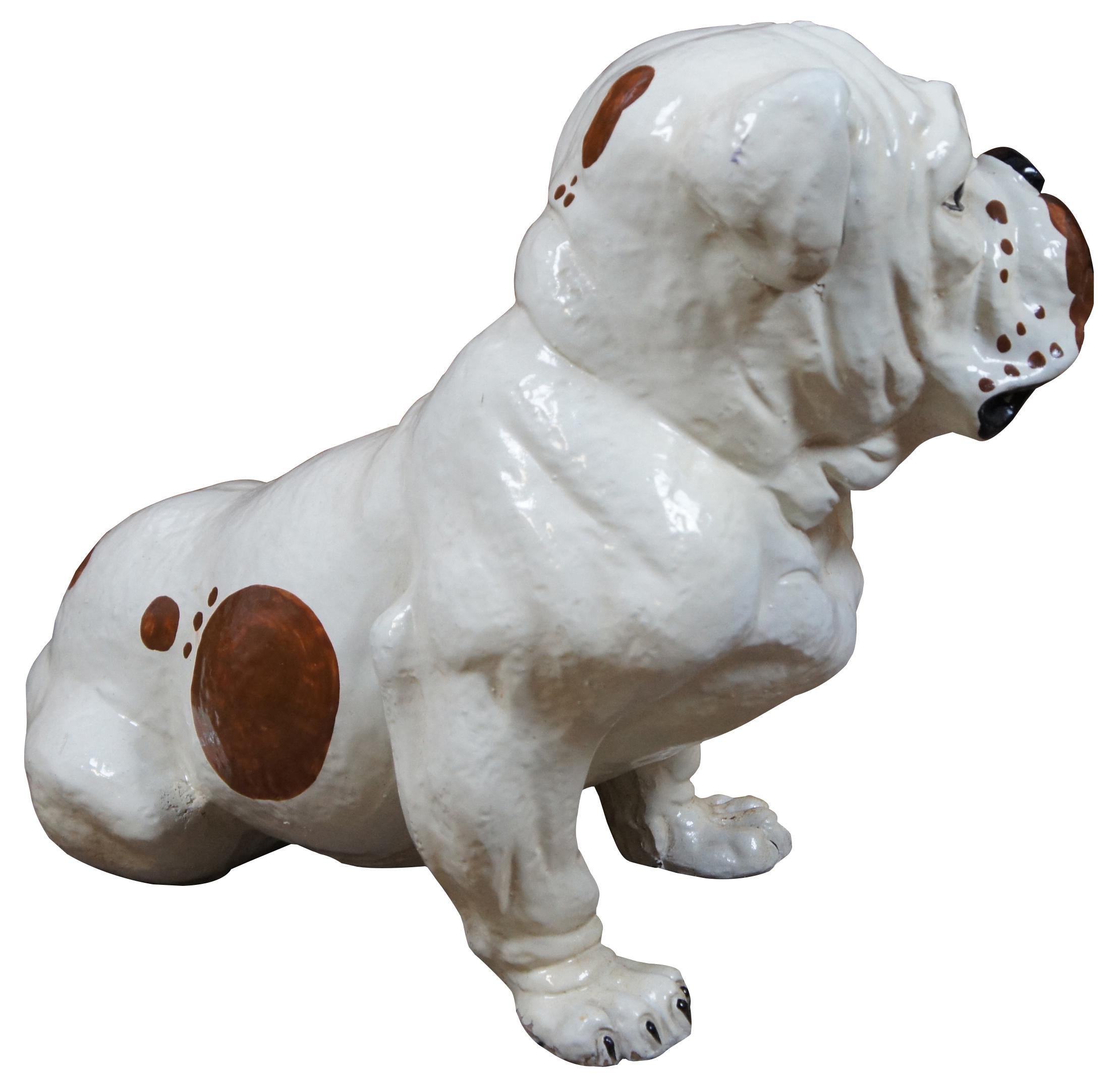 Life size vintage 1960s Marwal Ind. Inc chalkware English bulldog shaped sculpture or door stop painted in white with brown spots. Measure: 19