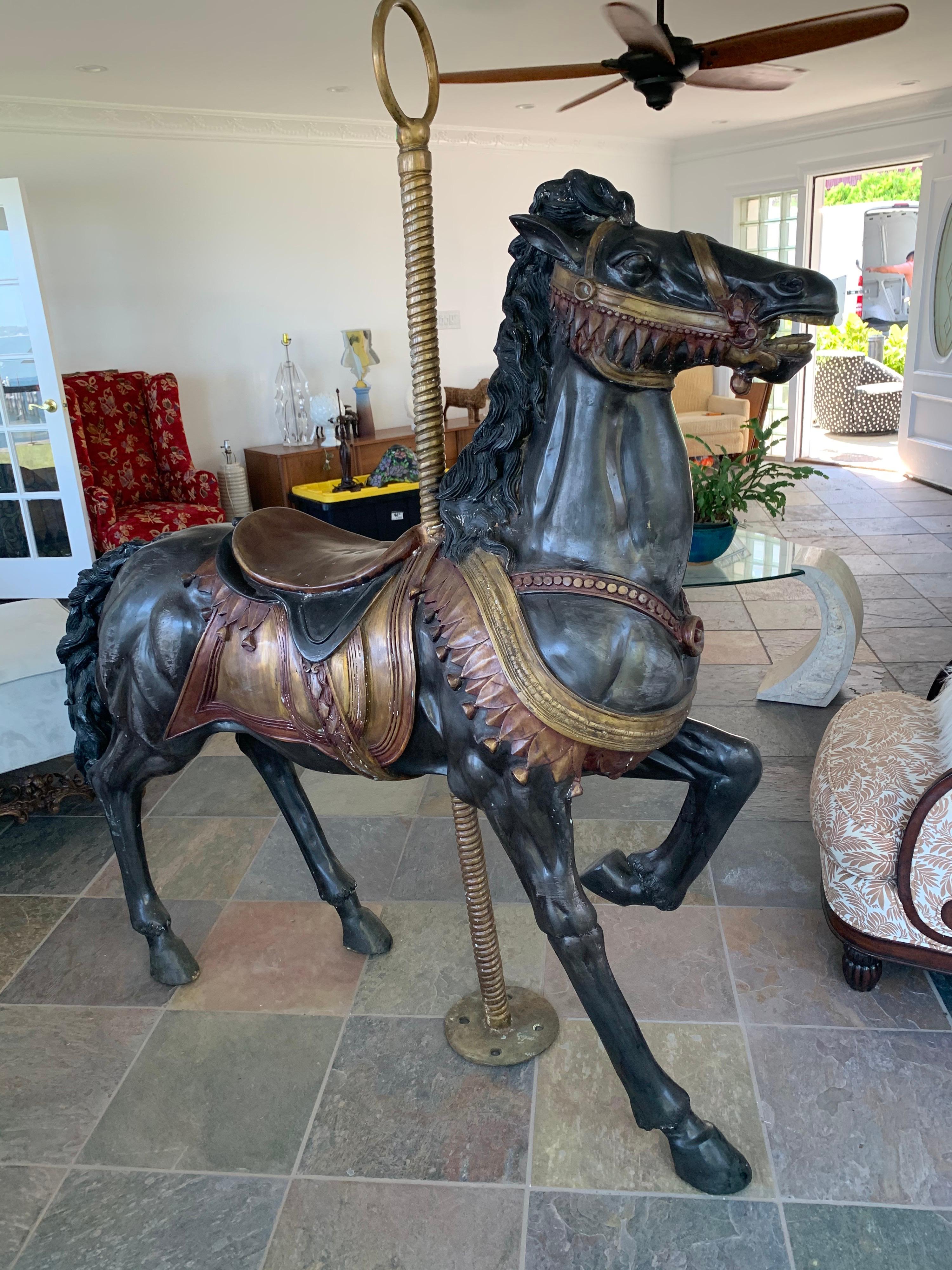 Magnificent antique carousel horse sculpture, all original. All dimensions are below. This is a large and heavy sculpture. The weight is approximately 210 pounds. Now, more than ever, home is where the heart is.