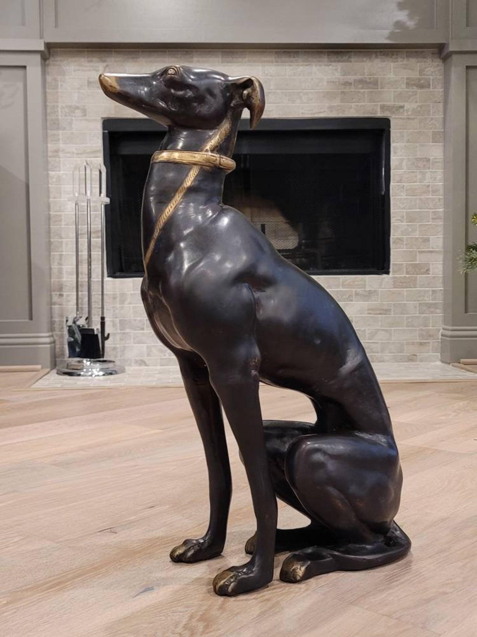 A life size Art Deco patinated bronze figural dog sculpture, most likely Italian, early/mid-20th century. 

Fine quality, exceptionally executed naturalistic rendering depicting Greyhound - Whippet, modeled seated at attention, featuring exquisite