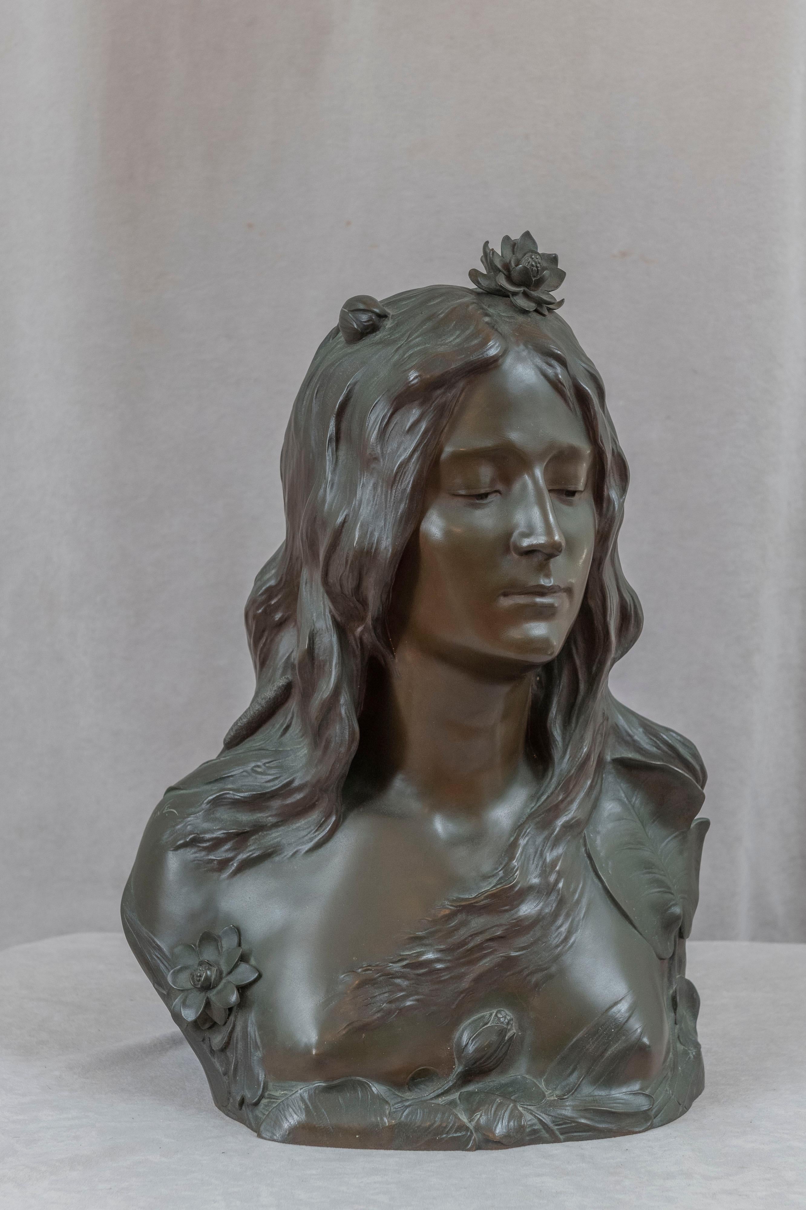  For the art nouveau lover, or anyone who loves beauty, here is a life size bronze beautifully cast young maiden finished in a warm rich patina. The young woman's countenance is so lovely and graceful. What an amazing piece to put in any room in