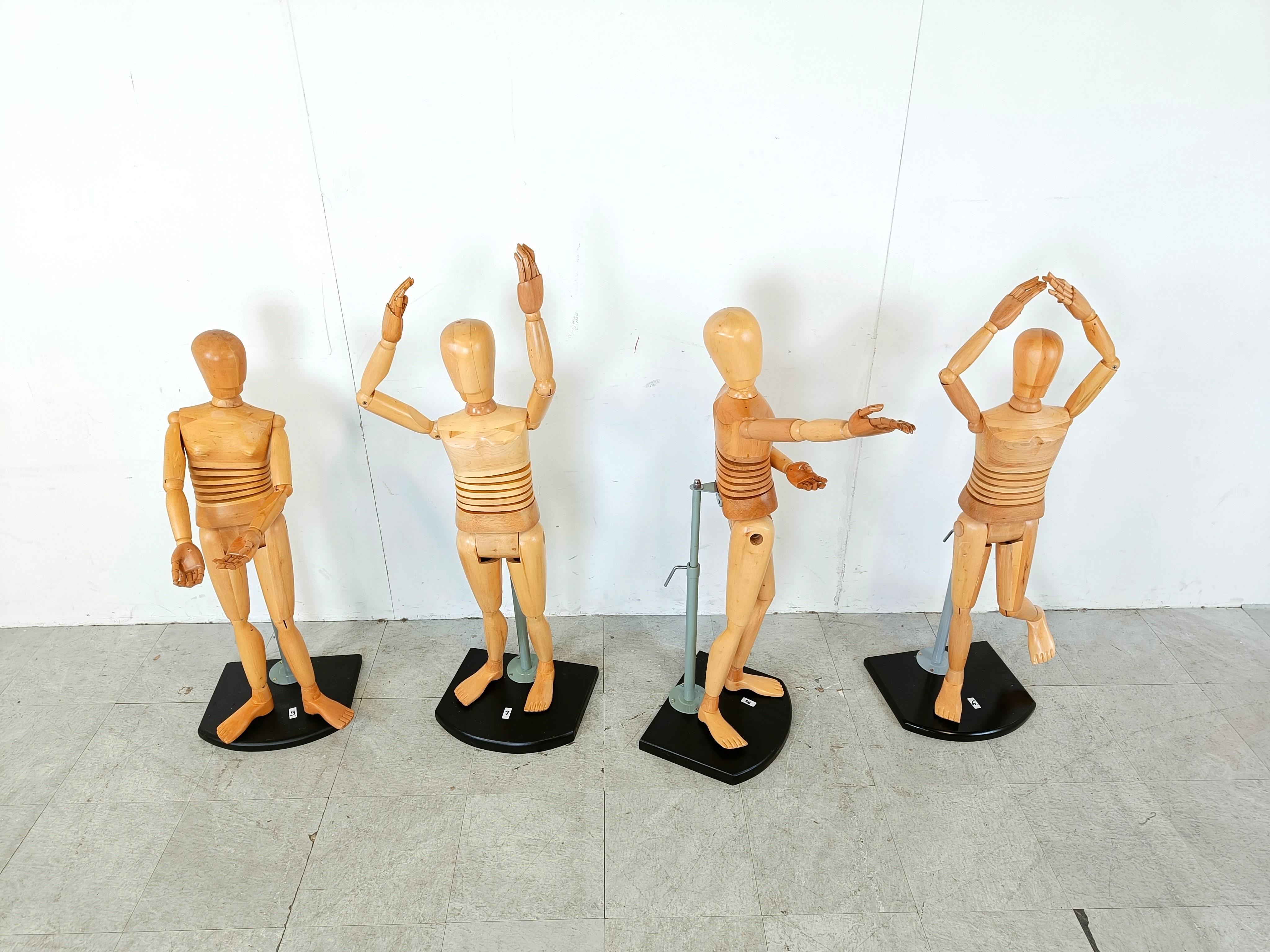 High quality wood articulated artistic Lay Figures.

These life size mannequins are made with great care and have a lot of positioning possibilities.

What is remarkable, is the engineering around the belly area, allowing these figure to bend in