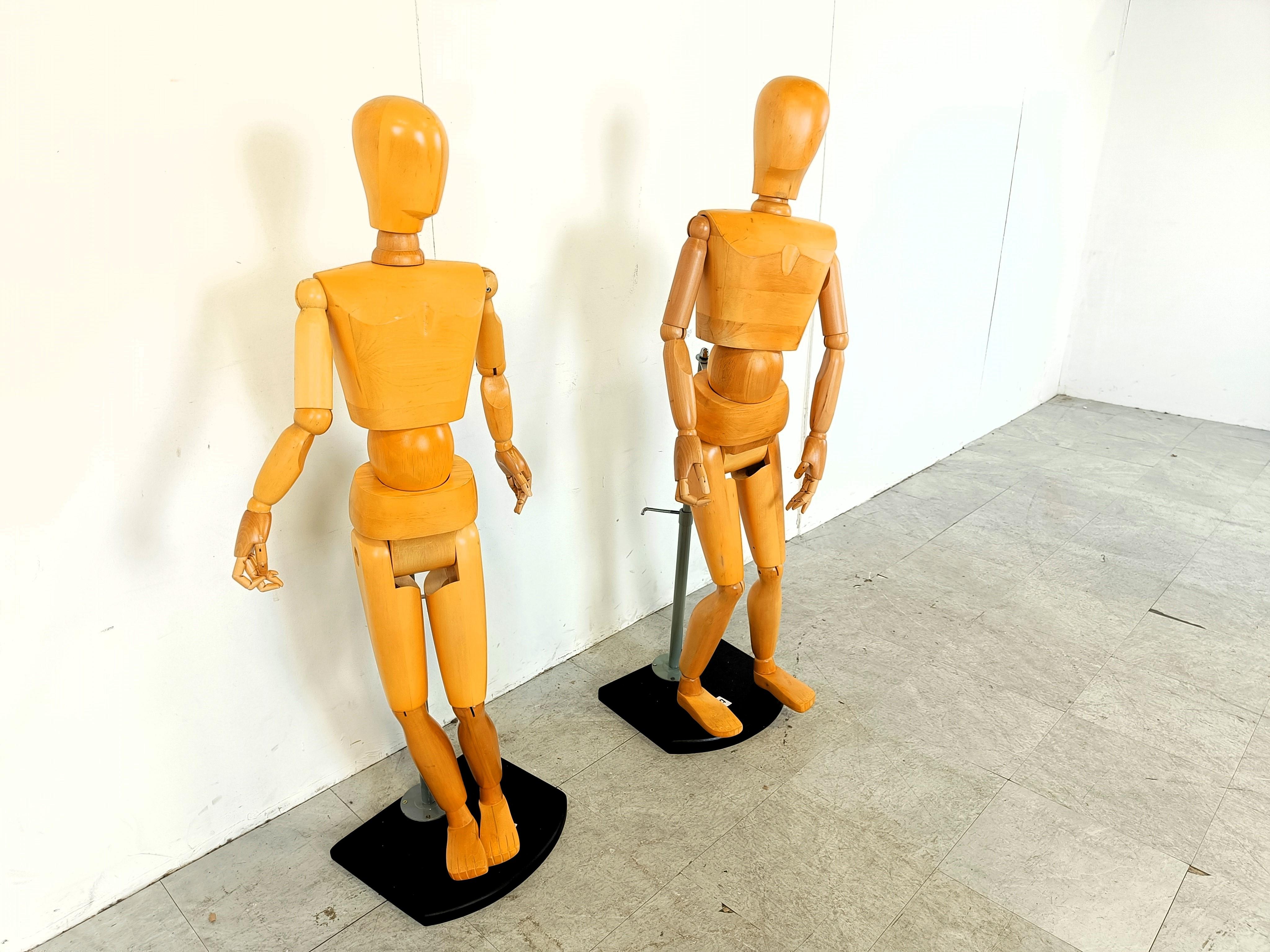 High quality wooden articulated artistic Lay Figures.

These life size mannequins are made with great care and have a lot of positioning possibilities.

What is remarkable, is the engineering around the belly area, allowing these figure to bend in