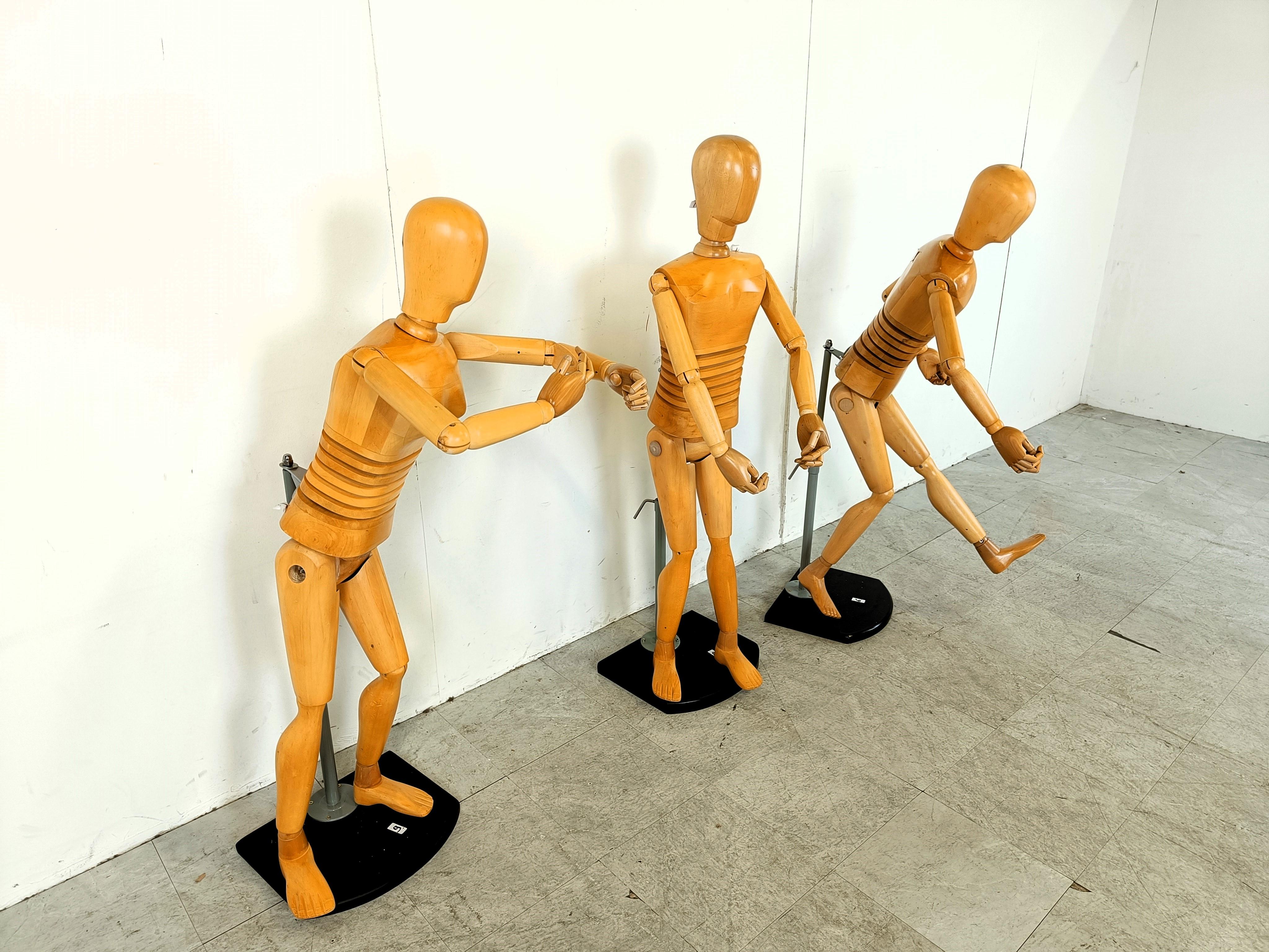 High quality wooden articulated artistic Lay Figures.

These life size mannequins are made with great care and have a lot of positioning possibilities.

What is remarkable, is the engineering around the belly area, allowing these figure to bend in