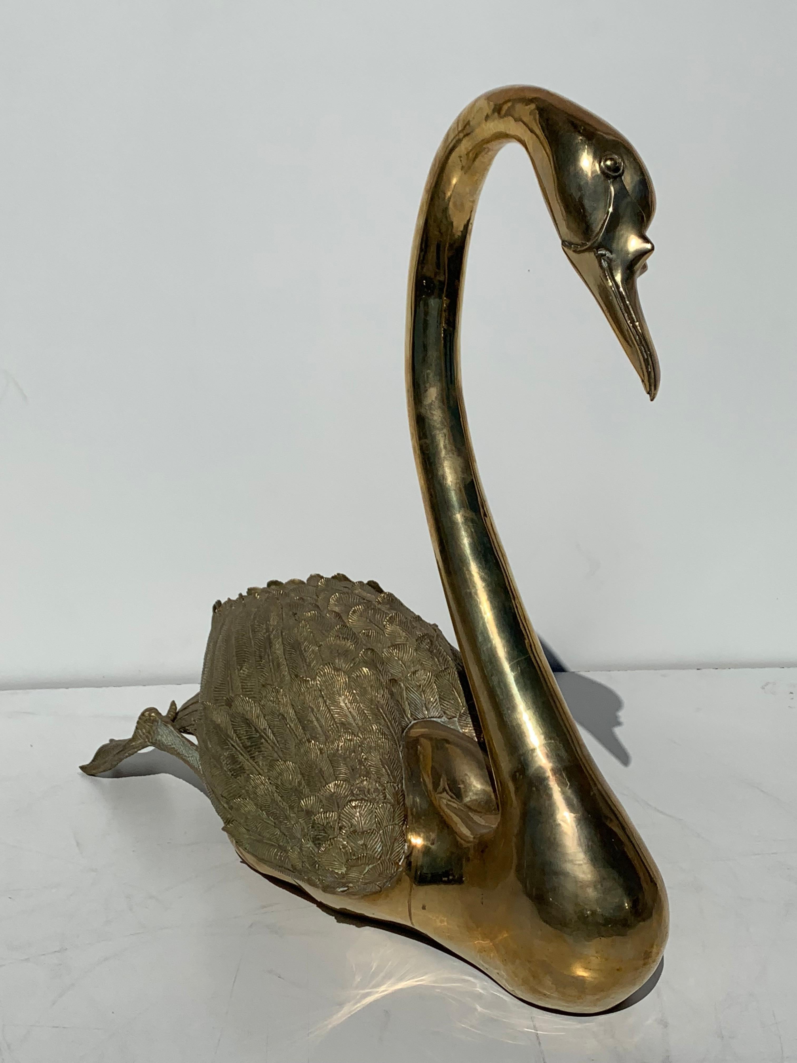 brass swans