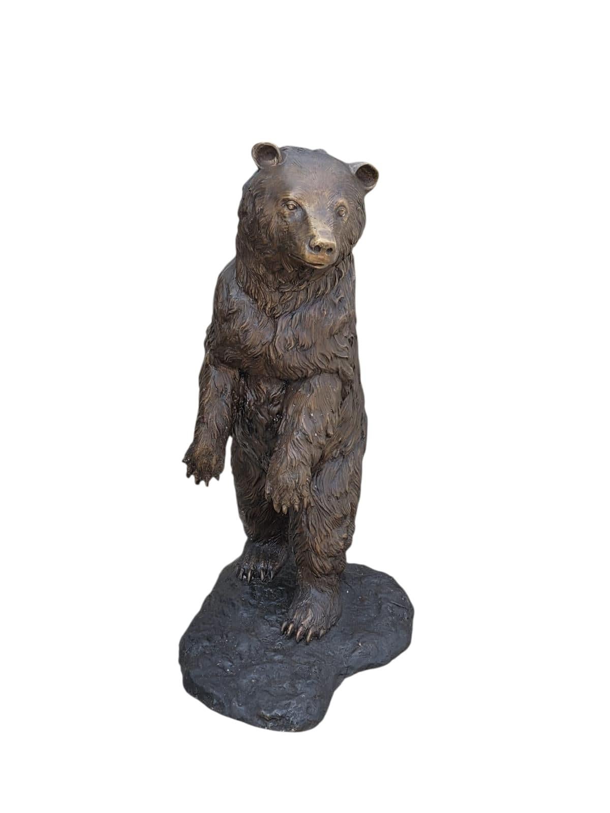 Impressive life-size bronze sculpture of a bear, cast in Naples, Italy, during the 20th century. This striking piece is executed with remarkable realism and attention to anatomical detail, capturing the power, texture, and natural posture of the