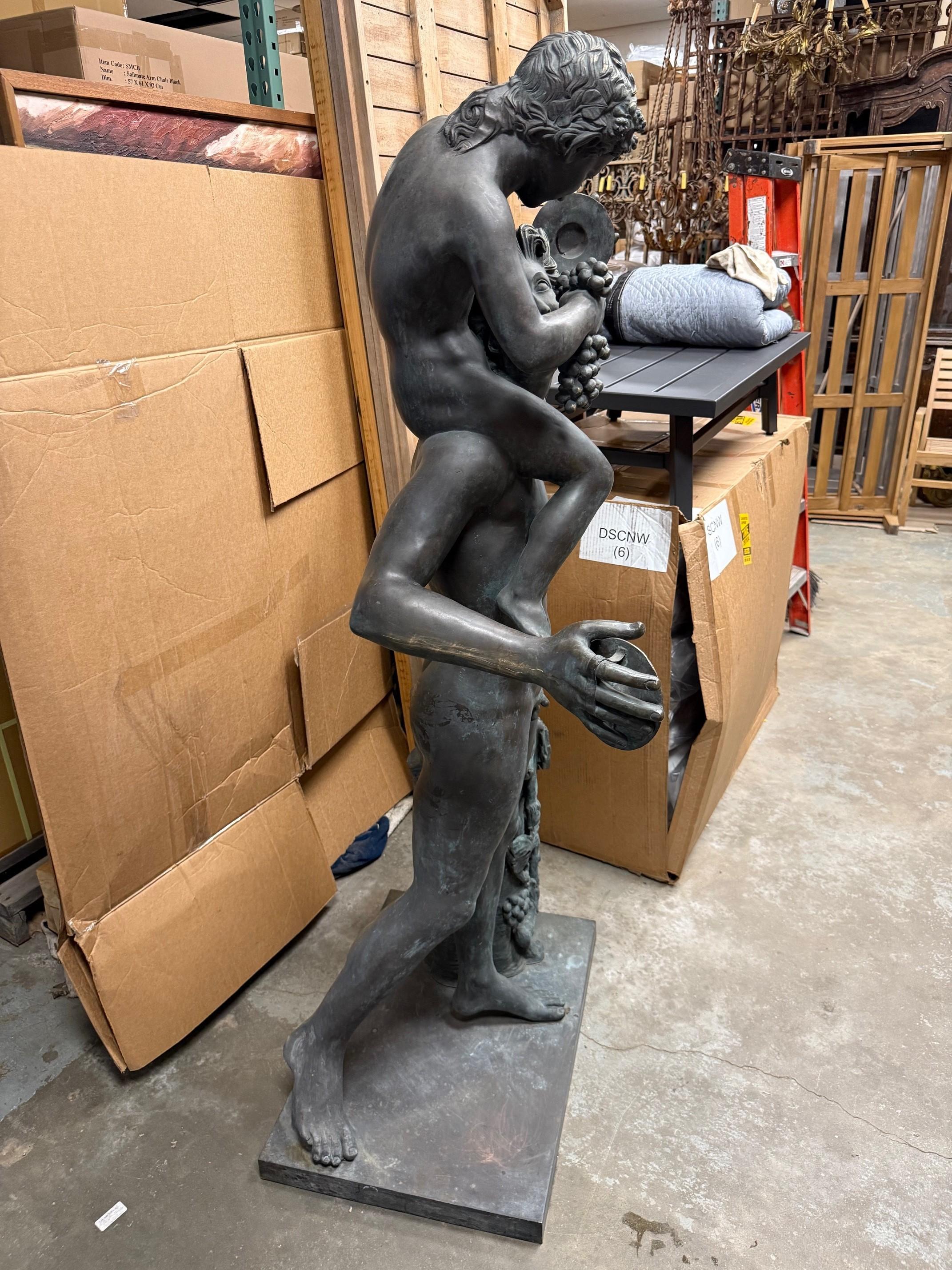Estatua de Baco desnudo en bronce tamaño natural Dios del Vino y el Jolgorio siglo XX en venta