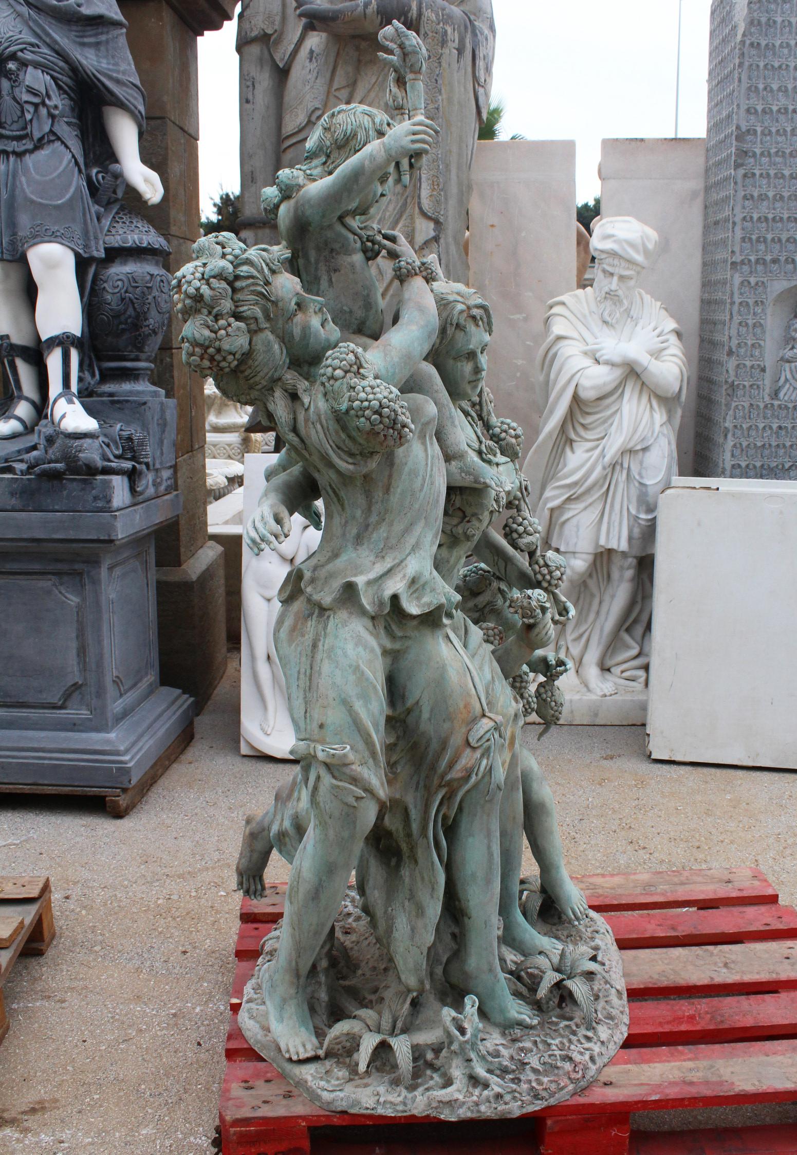 Life-size bronze sculptures of two ladies with cherubs, where the bottom one is holding grapes, a symbol for autumn that dominates the piece along with vegetative motifs. The top cherub is holding a pair of torches, that usually represent the cold