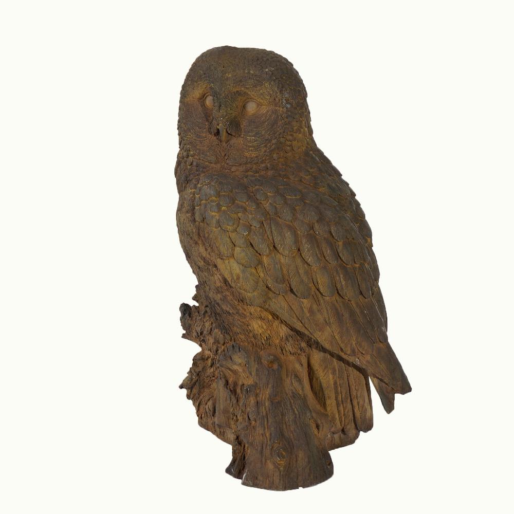 A figural garden sculpture offer bronzed cast hard stone life size great horned owl, 20th century.

Measures- 20.5''H x 11''W x 11''D.