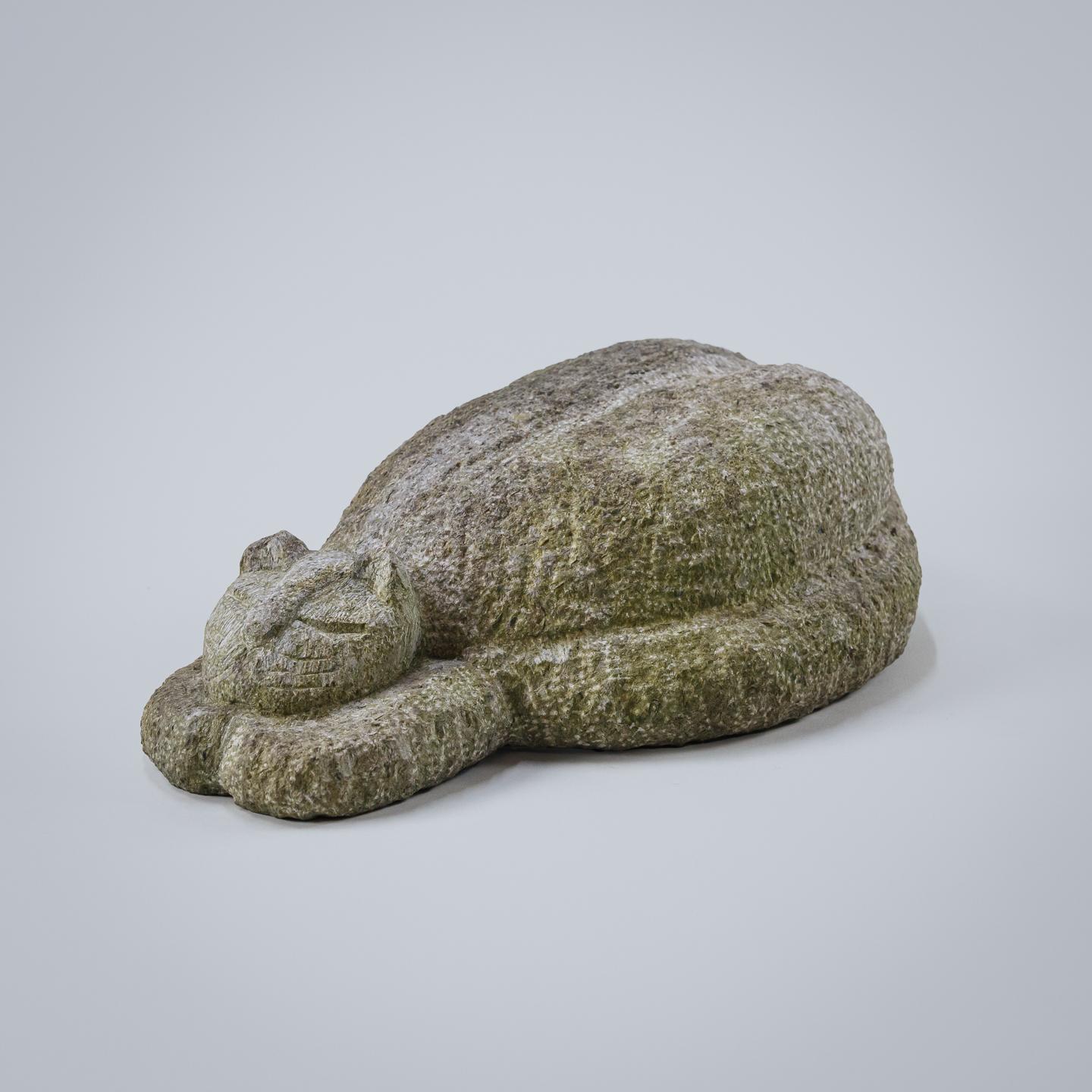 Engaging carved purbeck stone sleeping cat, dorset, England, Circa 1960.