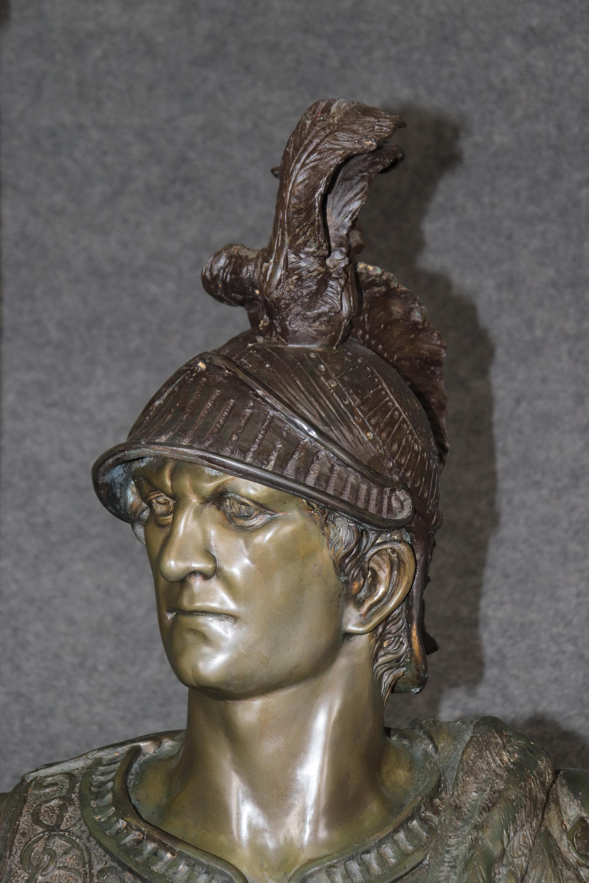 This is a fabulous and absolutely incredible cast bronze roman gladiator or centurion with his helmet, spear and shield. The lifesize scale of this absolutely gorgeous piece is complimented by the casting quality which is crisp, life-like and