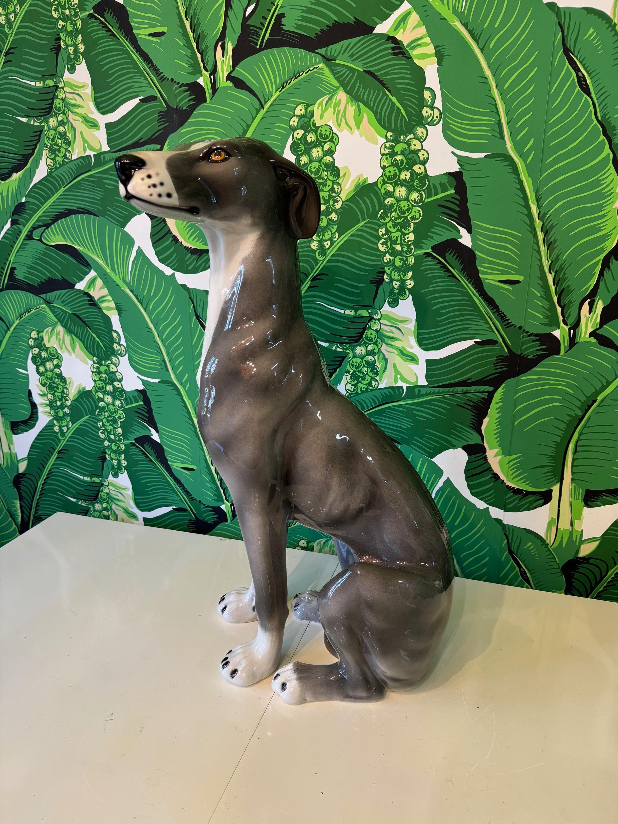 Large ceramic greyhound dog statue features life-like features and a high gloss finish. Very good condition with no cracks or chips.
For a shipping quote to your exact zip code, please message us.
