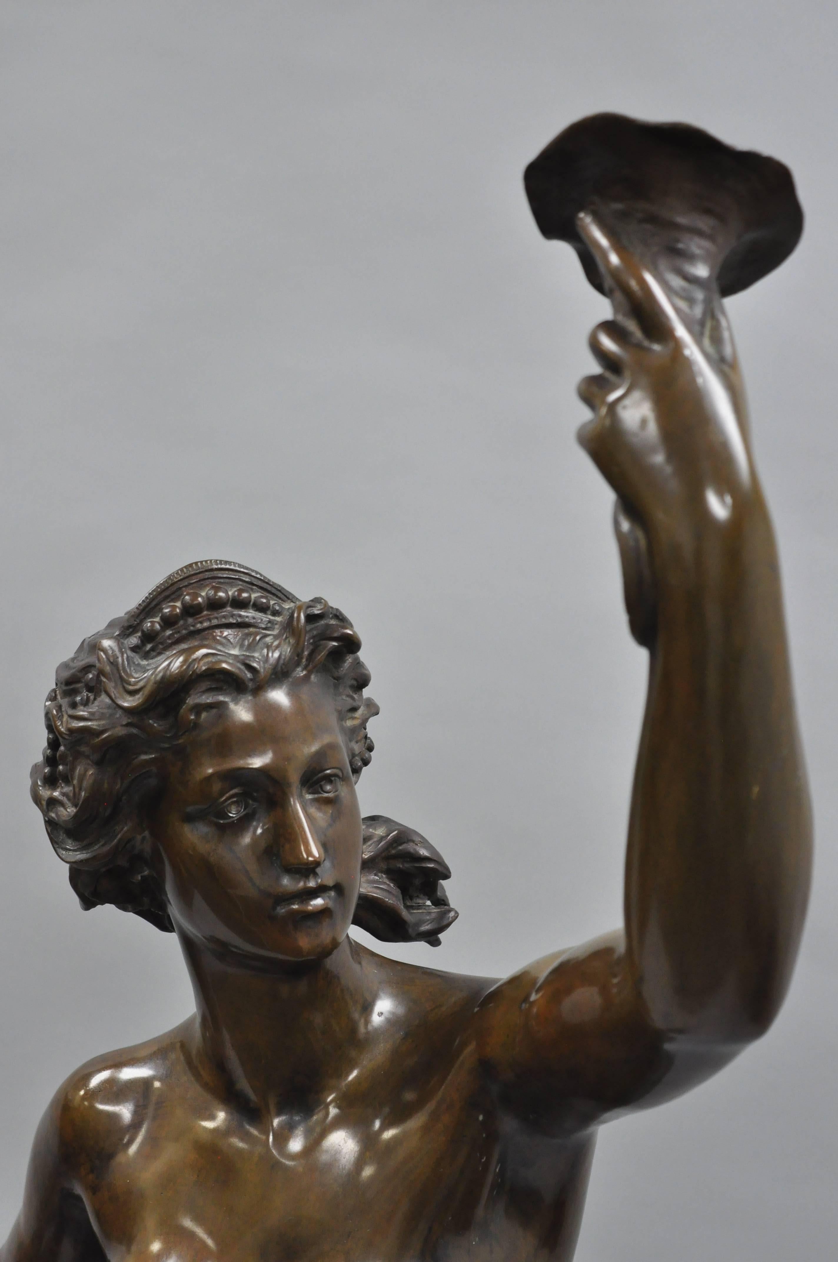 bronze female statue