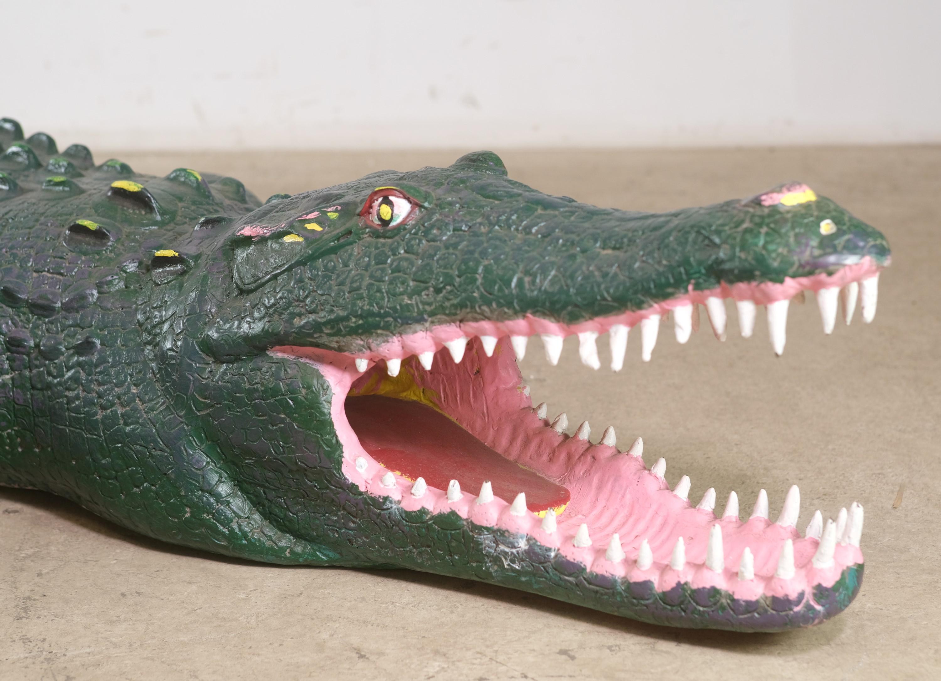 Life size and life like weatherproof crocodile. Hand painted made out of Fiberglas. Complete with open mouth with teeth. Here's looking at you! Please note, this item is located in our Los Angeles, CA location.