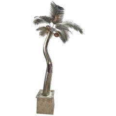 Palmera iluminada de tamaño natural en acero inoxidable