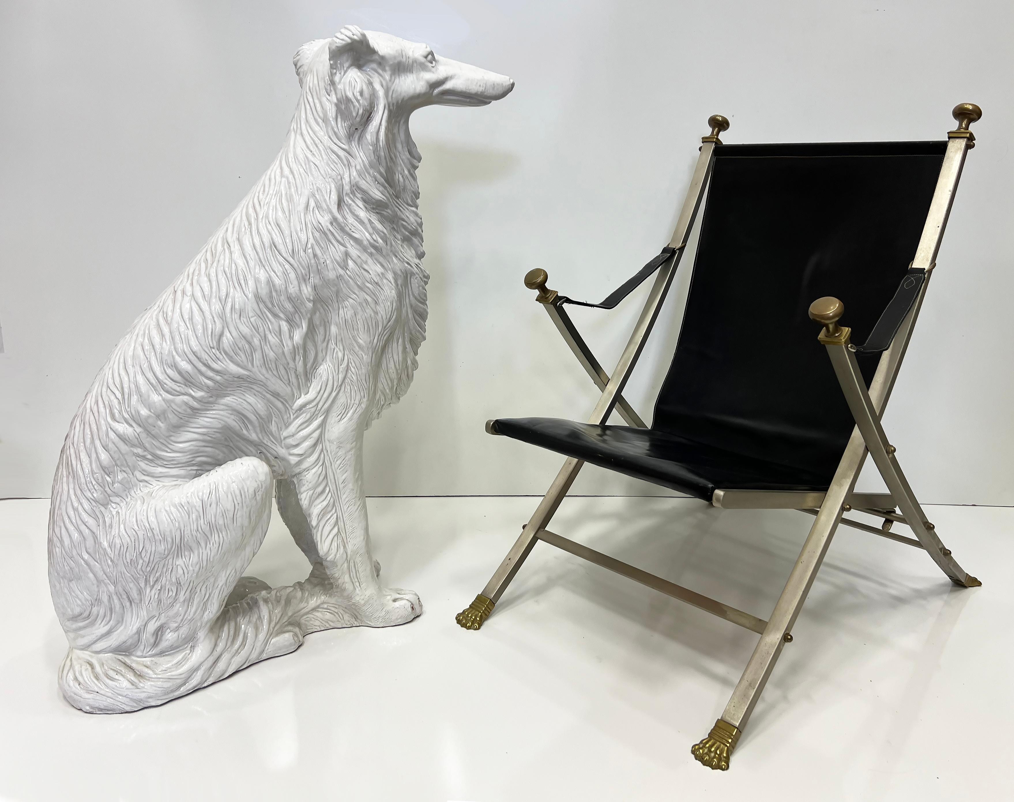 Lobo ruso Borzoi de terracota esmaltada italiana a tamaño natural

Se ofrece a la venta un impresionante Borzoi Lobero Ruso de terracota esmaltada italiana de tamaño natural.  El Borzoi está sentado y elegantemente elaborado con gran detalle para