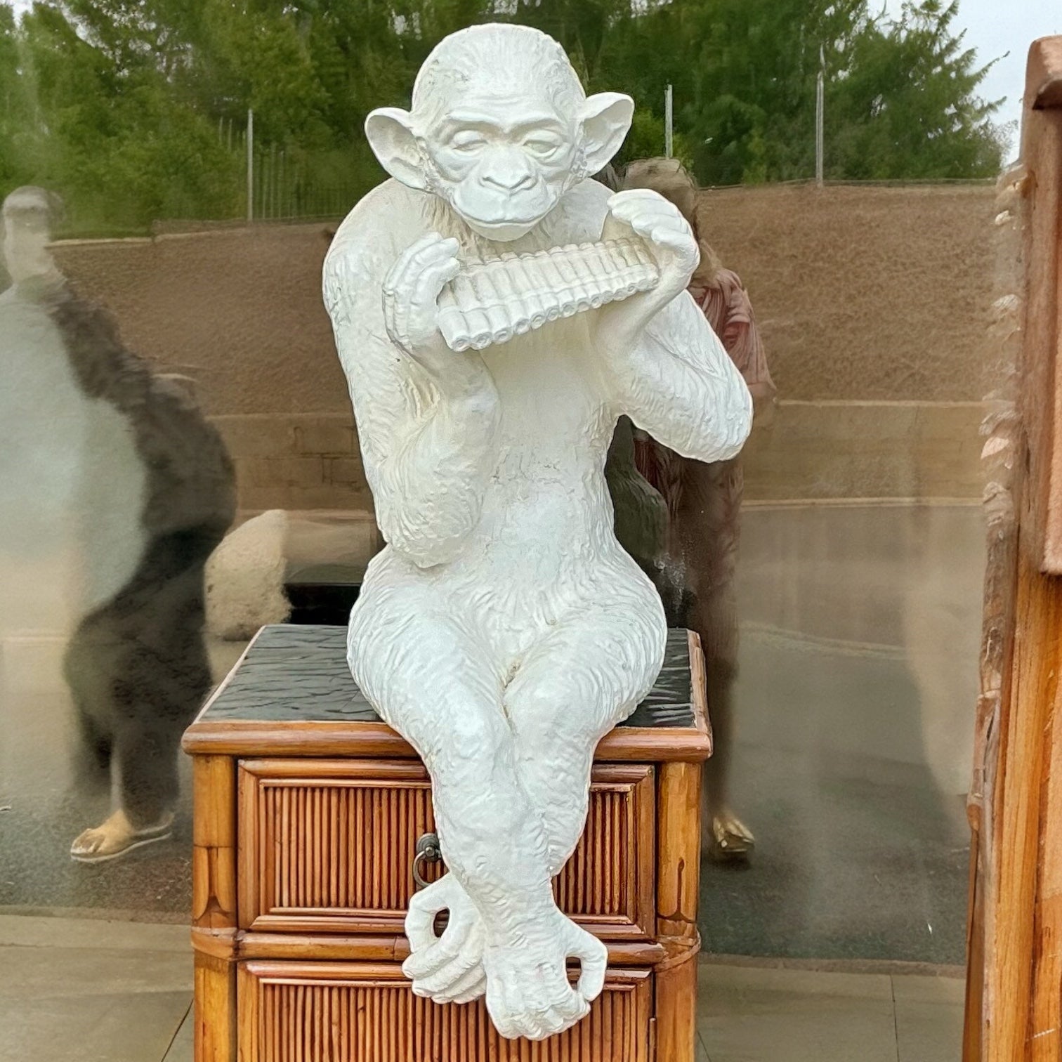 This is an Italian regency style large scale ceramic blanc de chine monkey figurine. It can sit on ledges and stools. It is in very good condition. Heel to behind the knee is 9.75”. Behind the knee to rump is 10”.