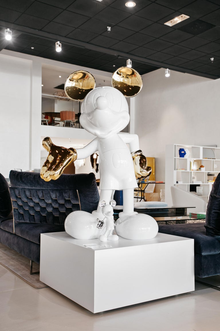 gold mickey mouse statue
