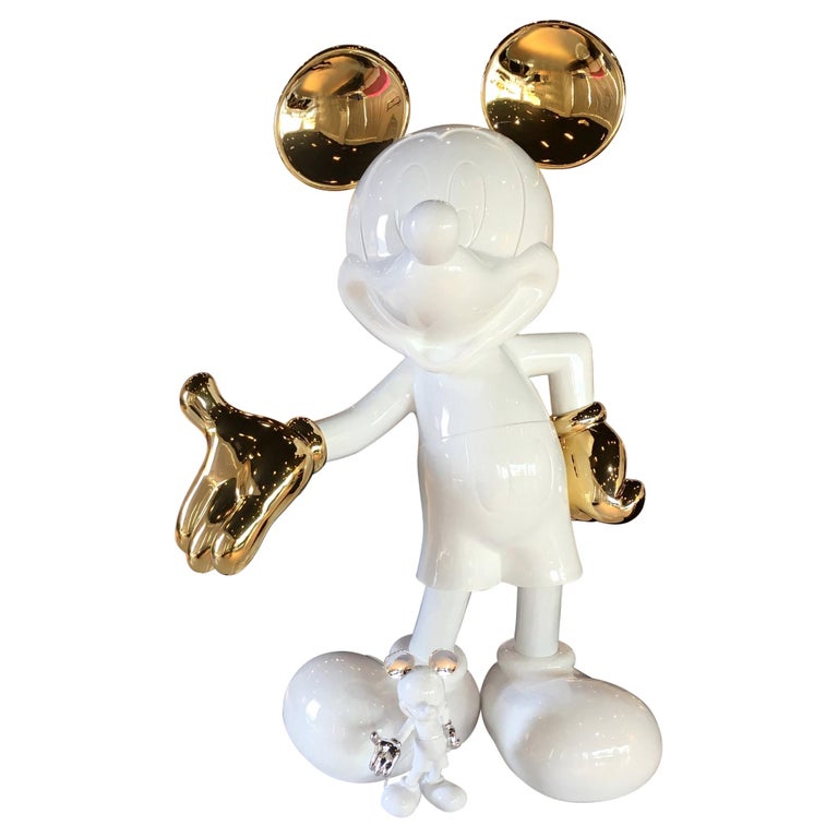 gold mickey mouse statue