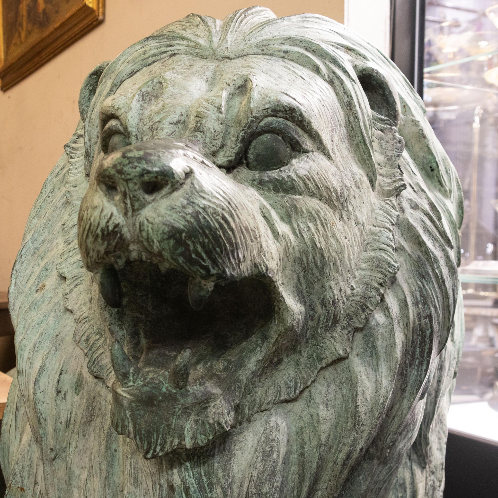 20th Century Life Size Pair of Verdigris Patinated Bronze Lions For Sale