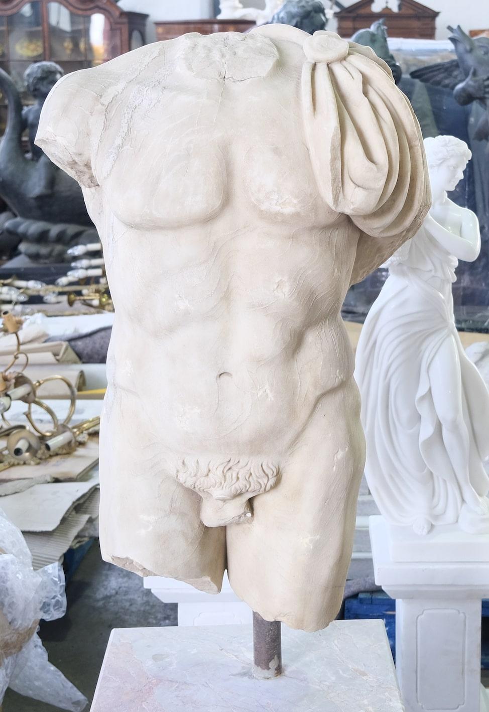 A life-size hand carved 20th century Roman Torso. The torso is carved from weathered statutory marble on a travertine base.

One of the most striking objects on display in the Mary and Michael Jaharis Galleries of Greek, Roman, and Byzantine Art at