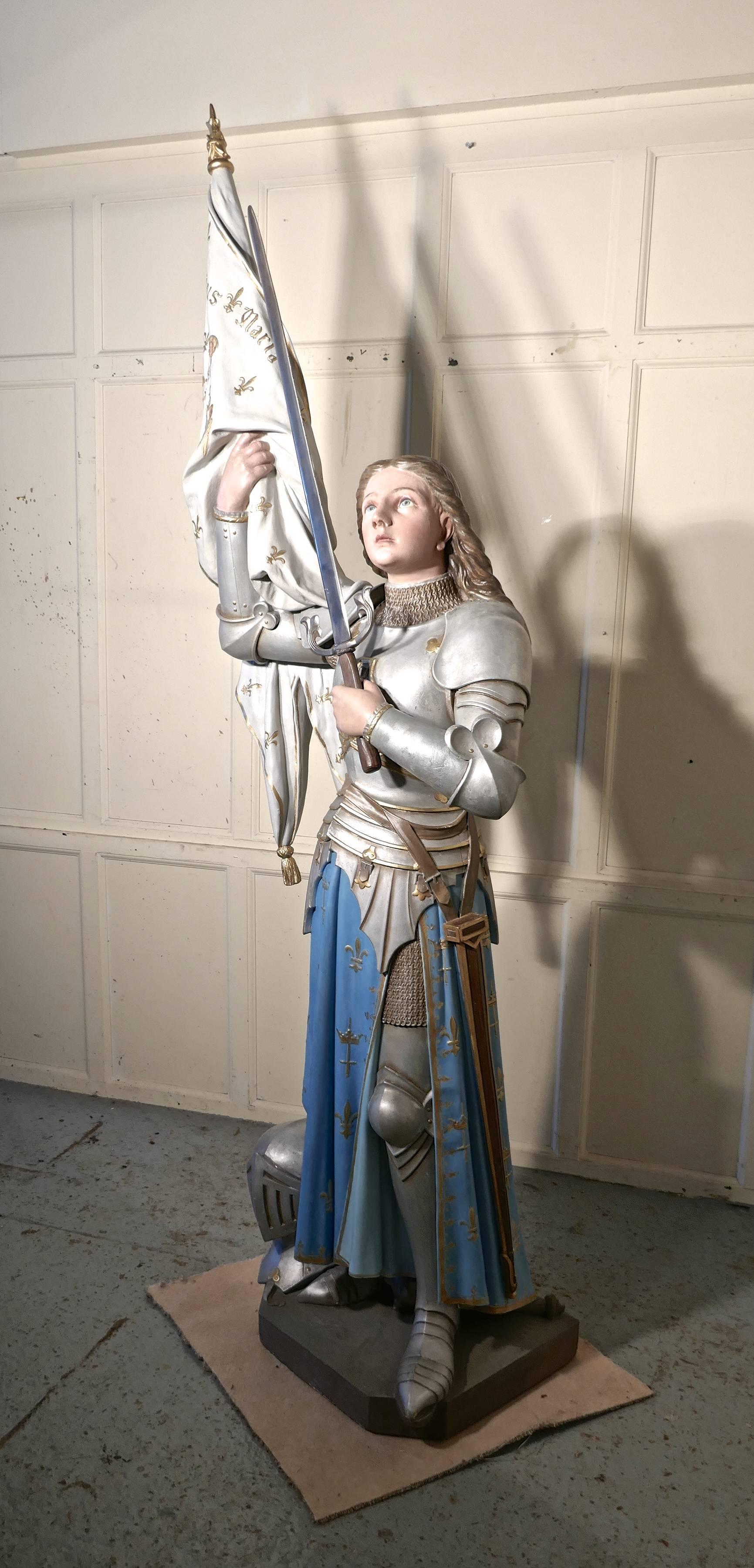 Lifesize sculpture, Joan of Arc from a French Cathedral 

We have a lifesize sculpture of St Joan in battle dress, this is an amazing piece, it dates from the middle of the 19th century and shows the saint in battle dress holding on high the