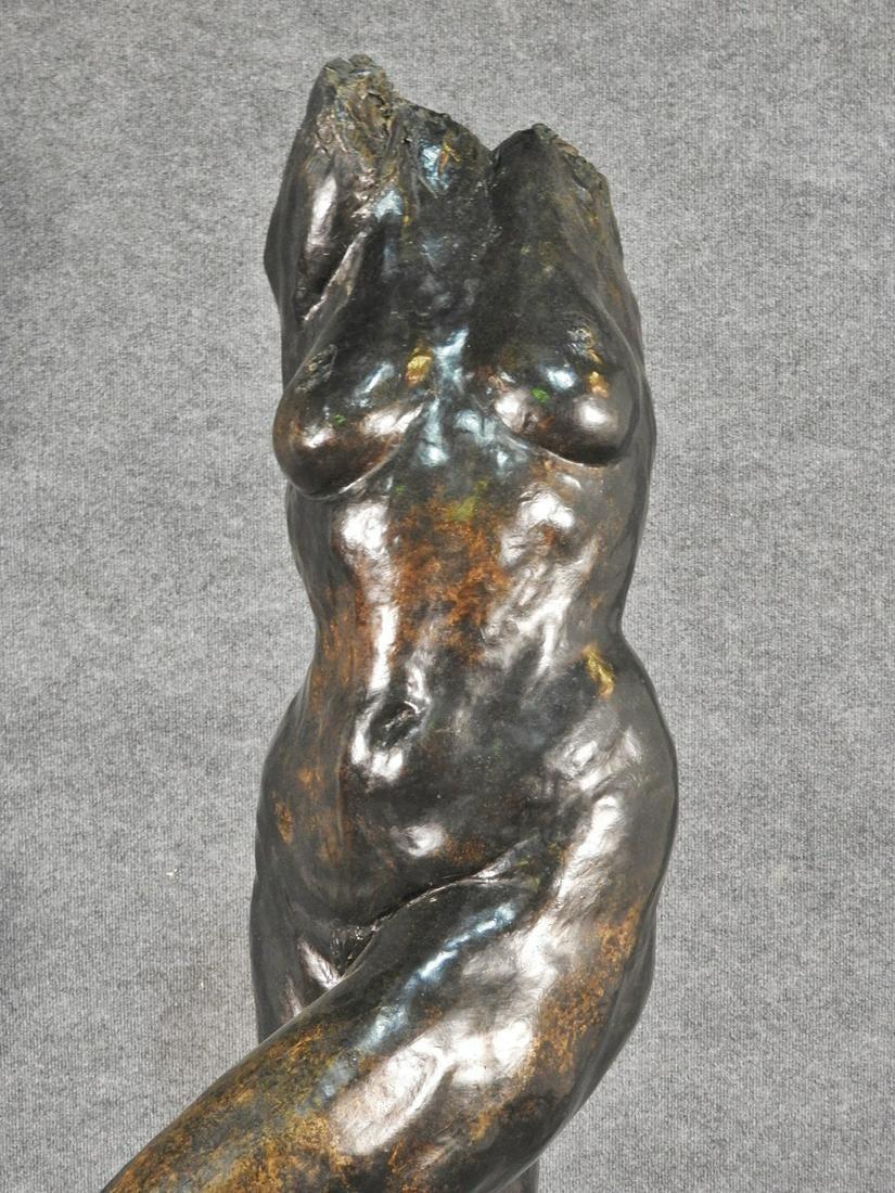 This is a life-size headless bronze figure from Gary Michael Weisman. The artist was Born 1952. Signed. Numbered 2/10. Bronze. Wood base. Measures: 68 1/2