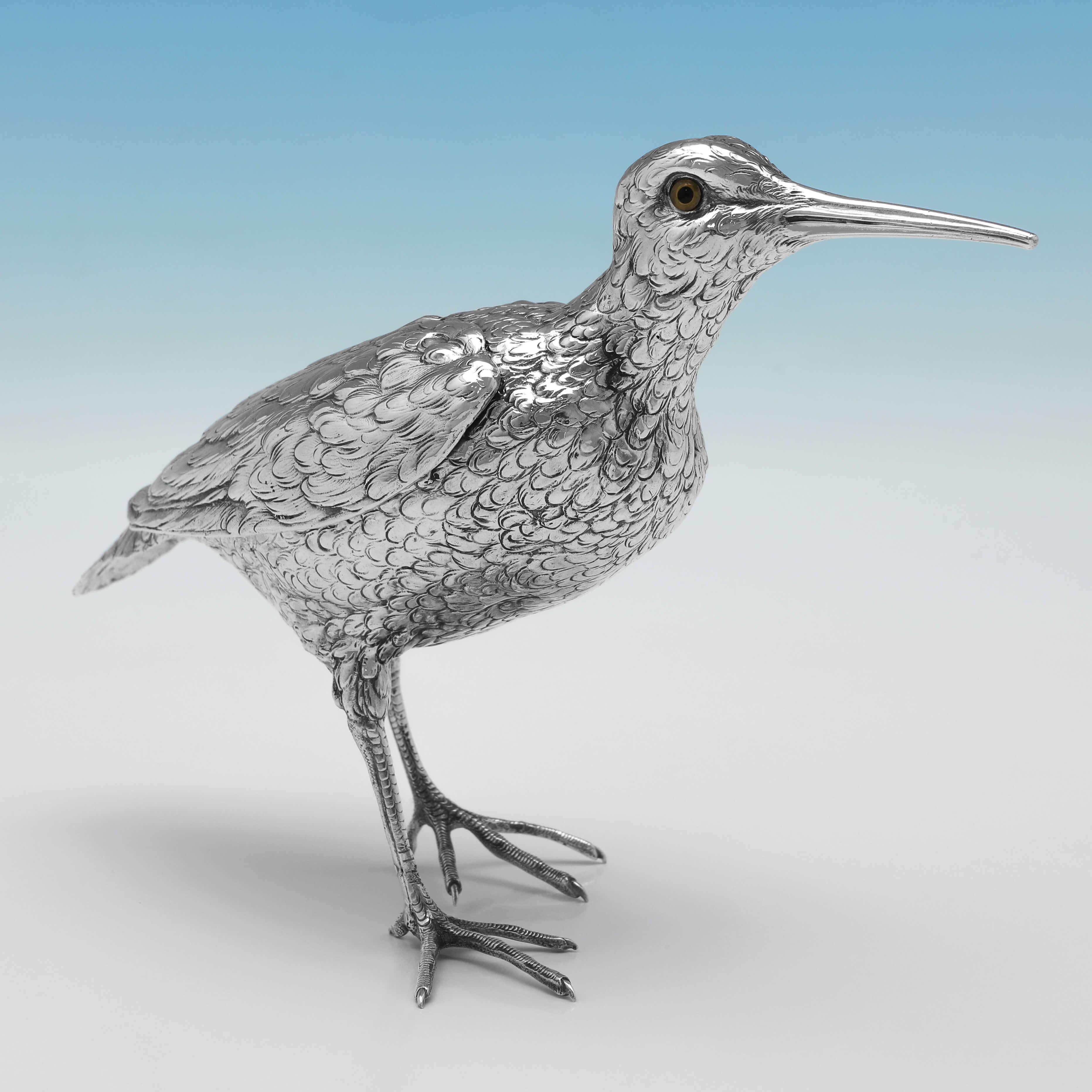 Carrying Import marks for London in 1930 by Ludwig Nereshiemer, this charming, Sterling Silver Model of A Snipe, is realistically poised. 

The snipe measures 7