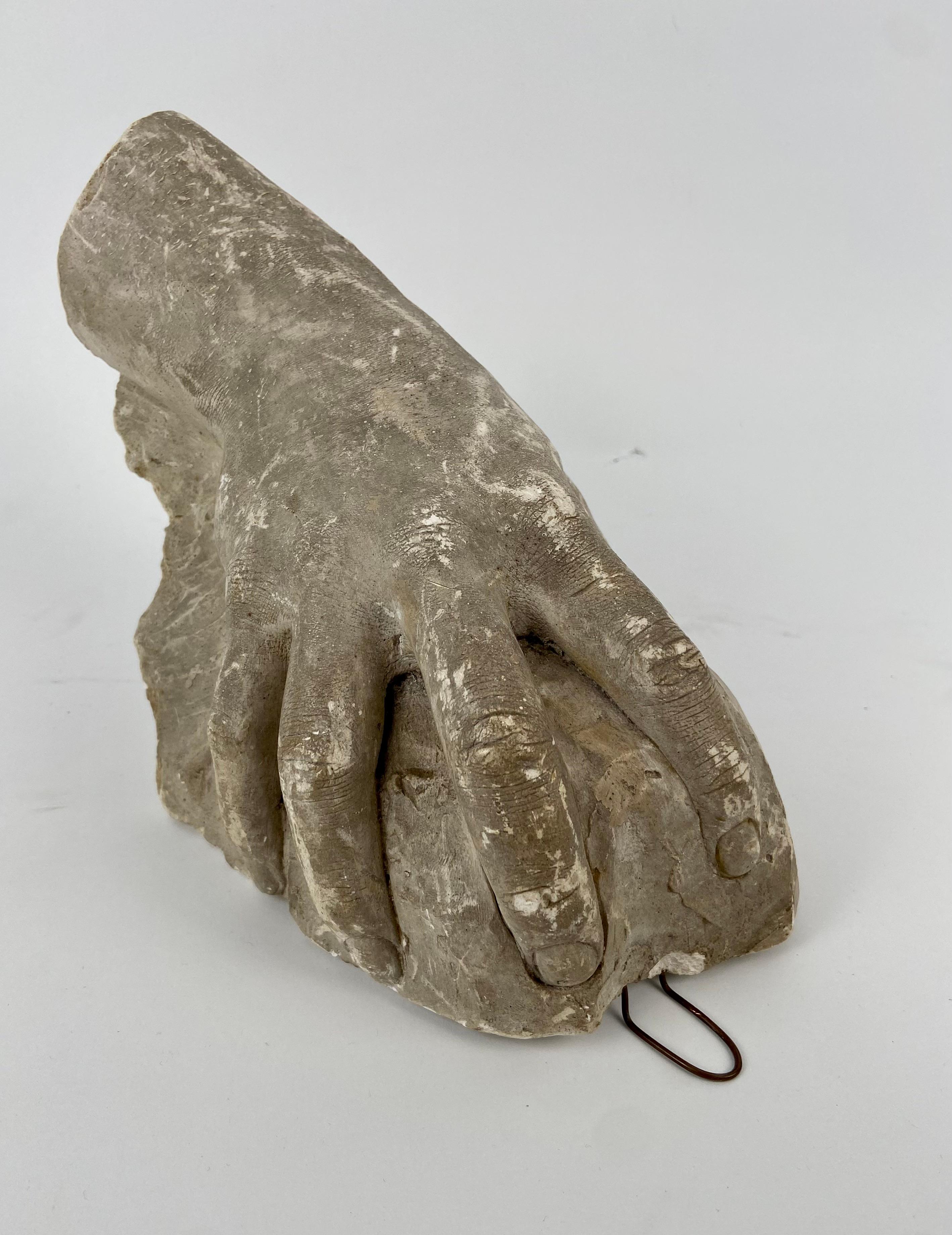 Life size stucco hand, study.