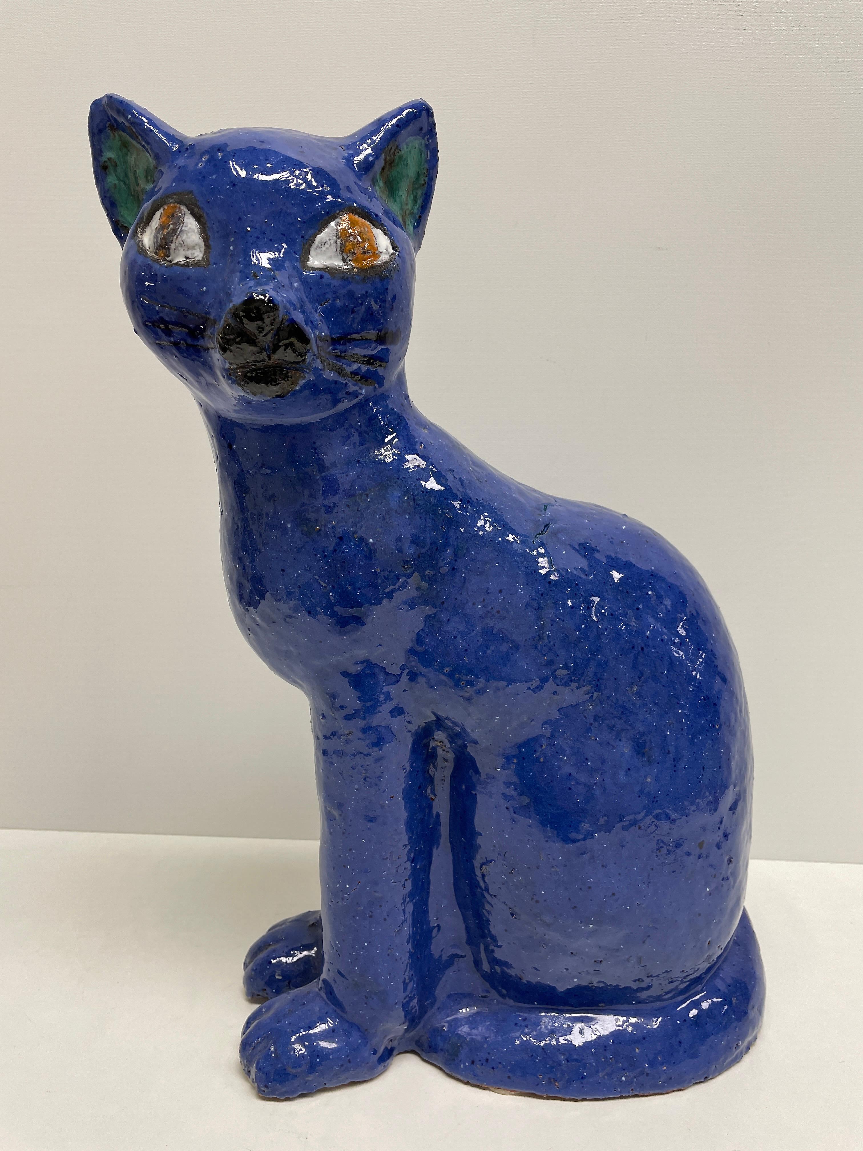 Mid-Century Modern 1970s German cat earthenware statue figurine. Nice addition to your room or entry hall. Made of earthenware ceramic, hand painted. A hand made studio pottery item that shows the beauty of the object and the artistic ability of the