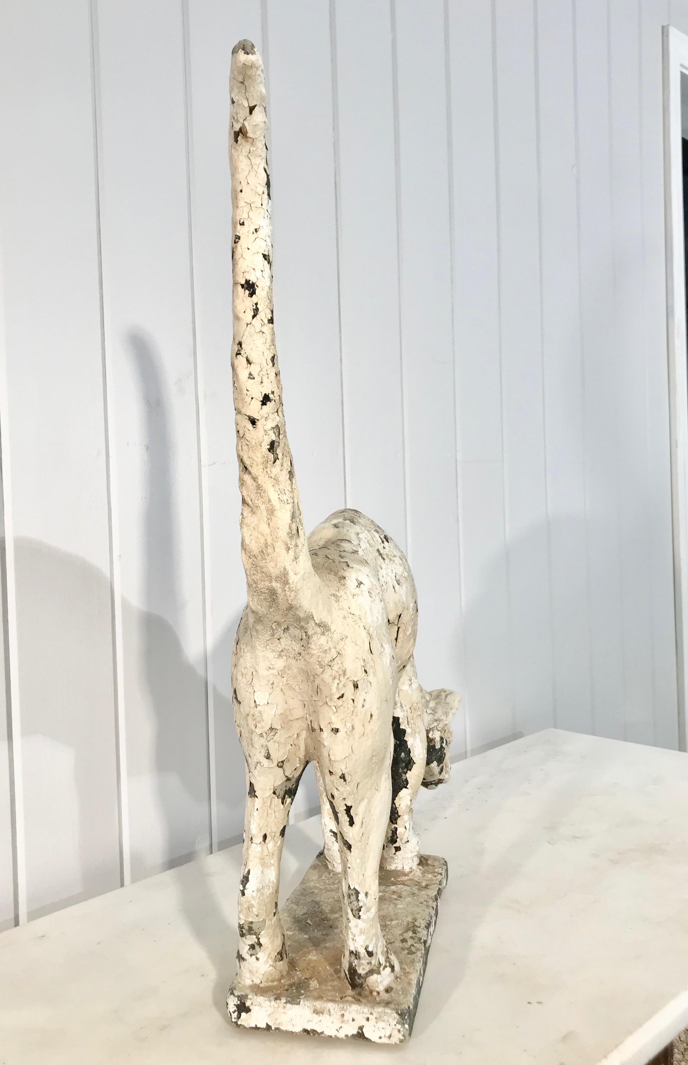 This is the very best cat statue we have ever owned! With outstanding form, a fabulous face, and in all-original paint, it will make a stunning addition to your collection. There is an old and nearly-invisible repair to the base of the tail, but