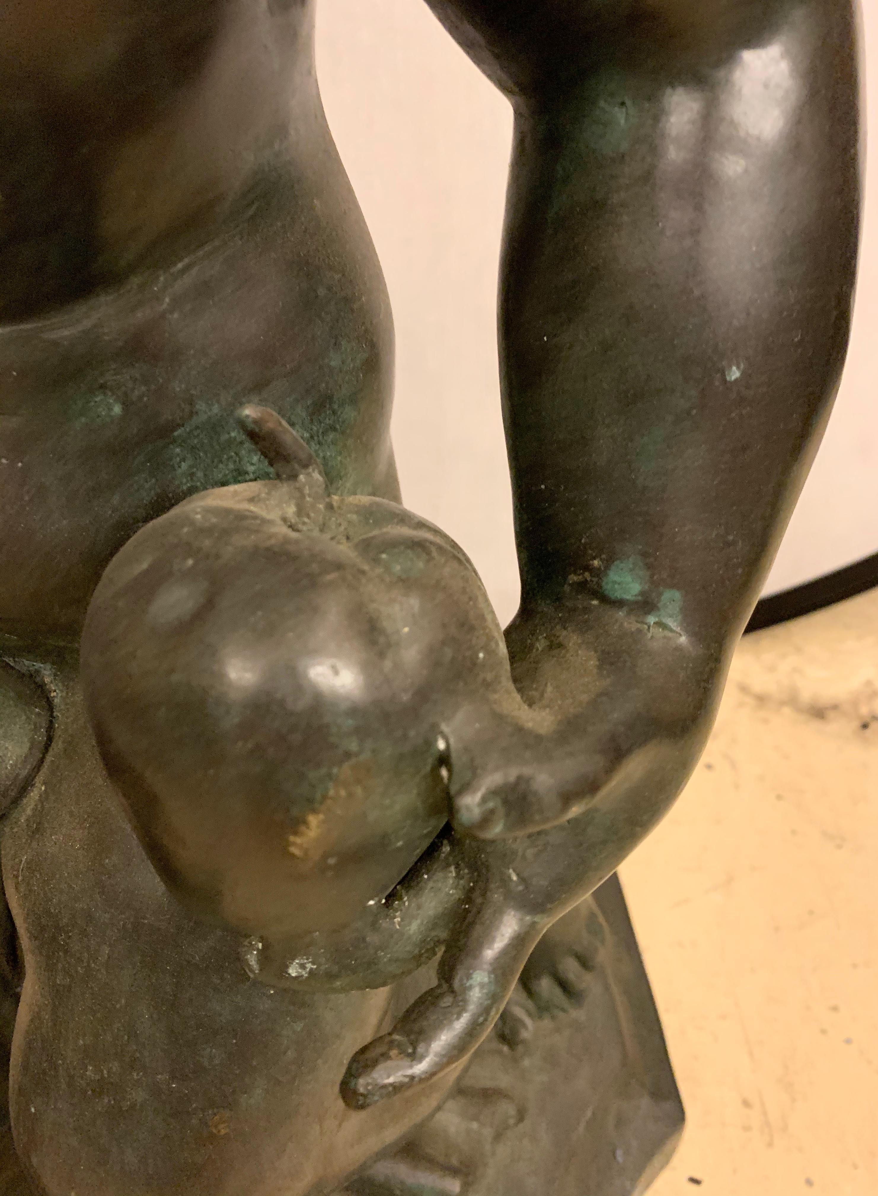 Belle Époque Life-Sized Bronze Cherub Kneeling Figure Holding Fruit Basket