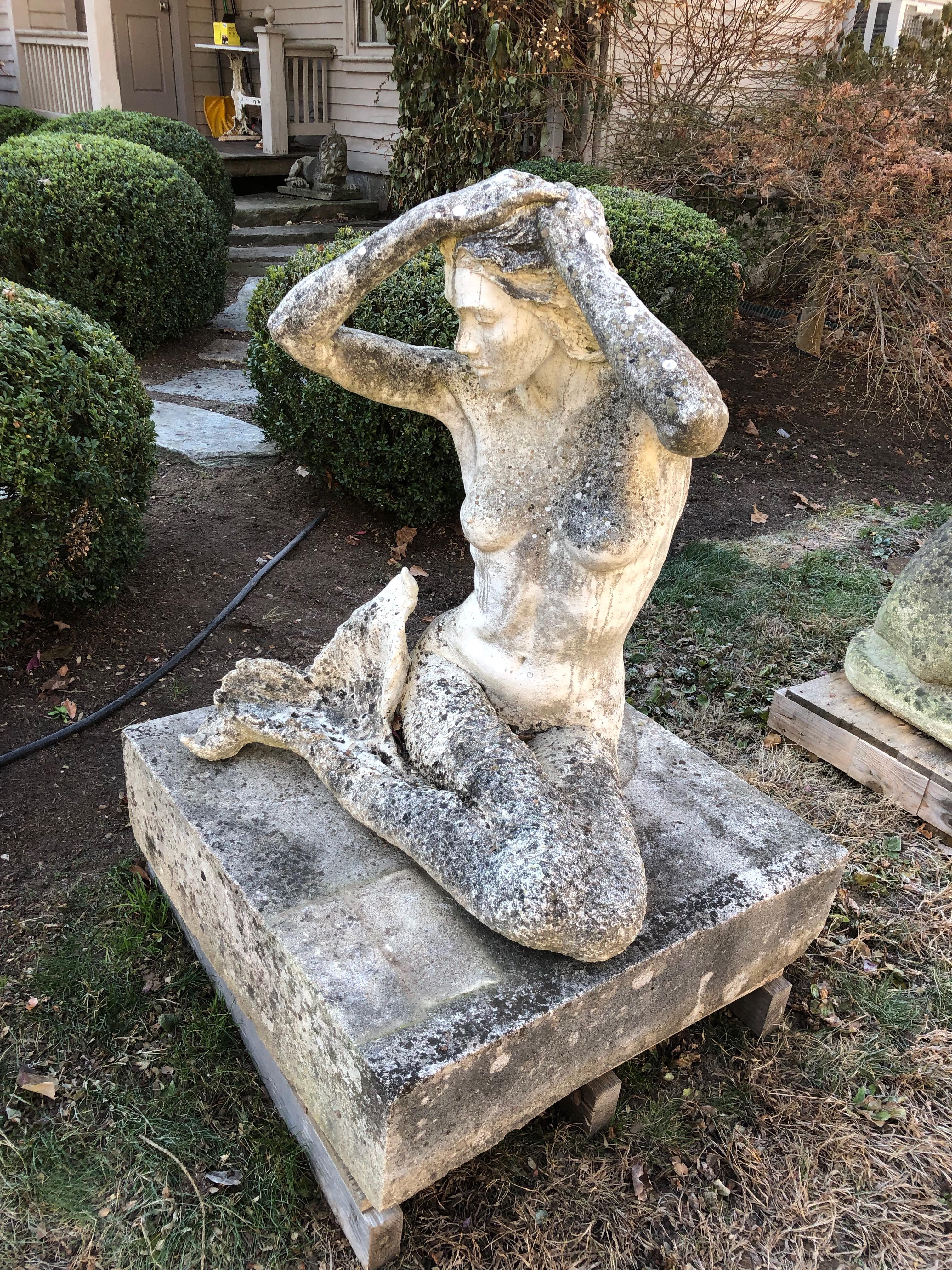 Life-Sized English Cast Stone Statue of a Mermaid Atop a Carved Stone Base In Good Condition In Woodbury, CT