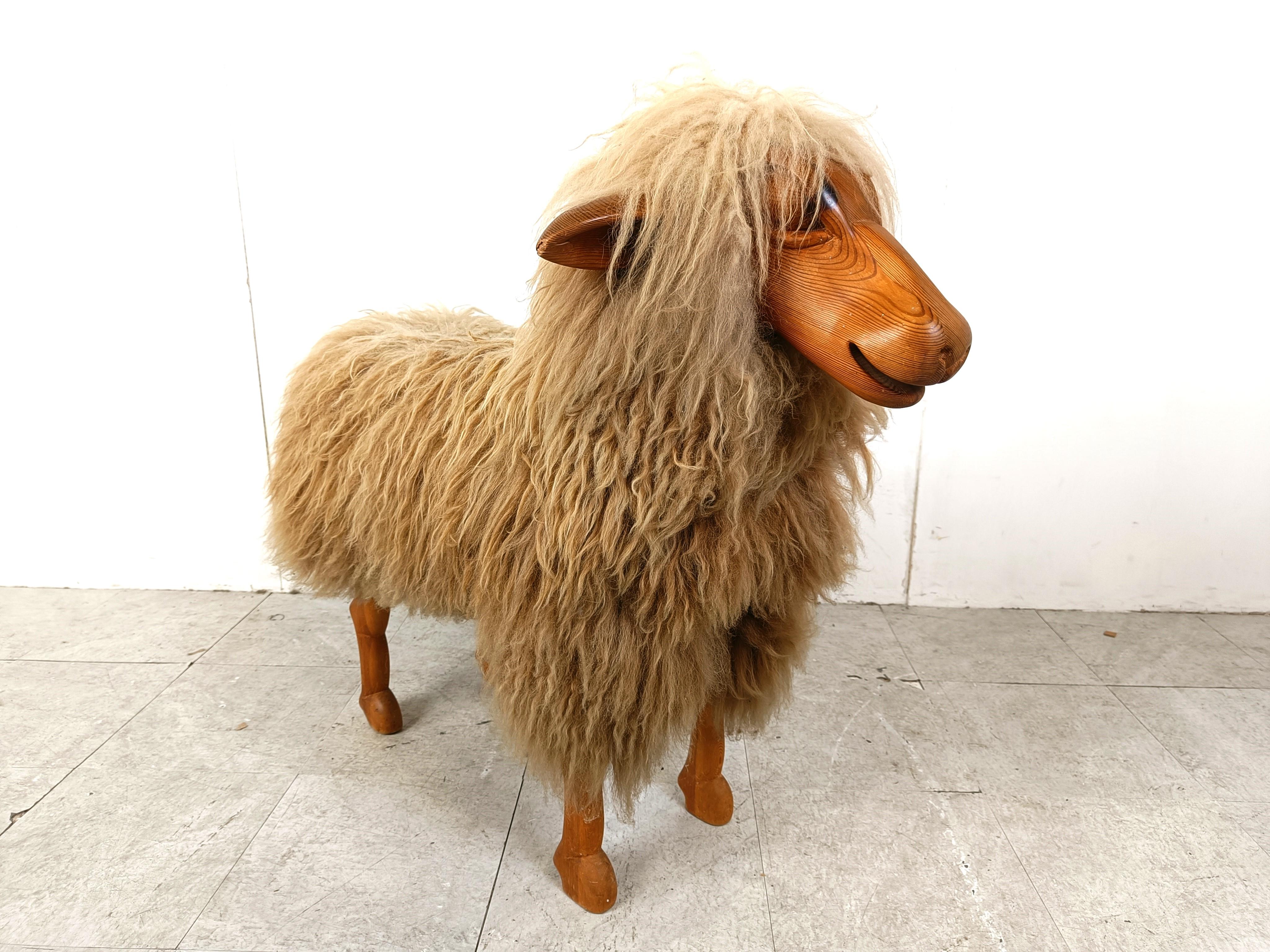 
Impressive mid century life size sheep stool.

Made from beech wood and real wool.

A very decorative item.

One ear has had a slight damage, other then that its in good condition

1970s - Germany

Height: 85cm
Width: 100cm
Depth: 45cm
Seat height: