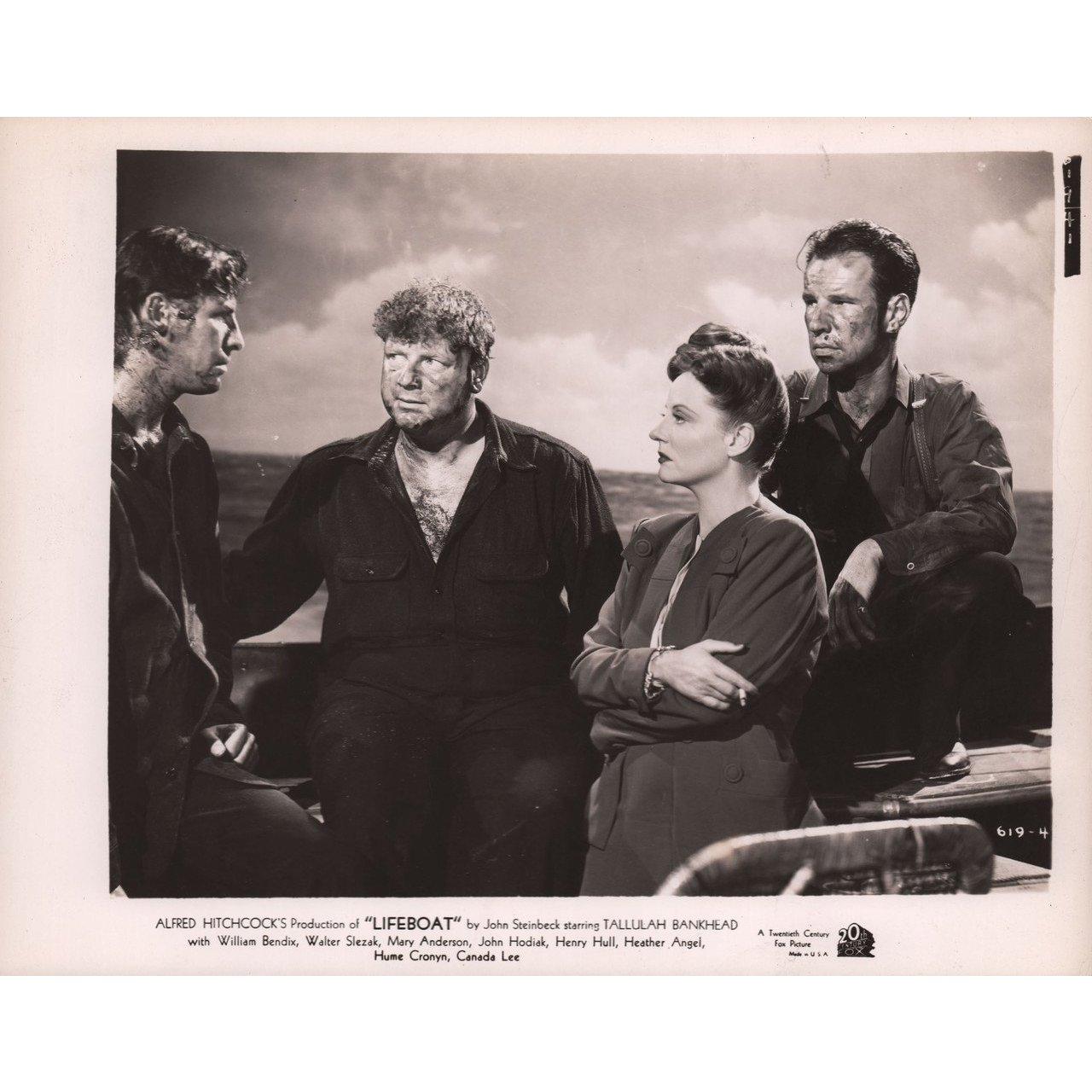 Original 1944 U.S. silver gelatin single-weight photo for the film Lifeboat directed by Alfred Hitchcock with Tallulah Bankhead / William Bendix / Walter Slezak / Mary Anderson. Fine condition. Please note: the size is stated in inches and the