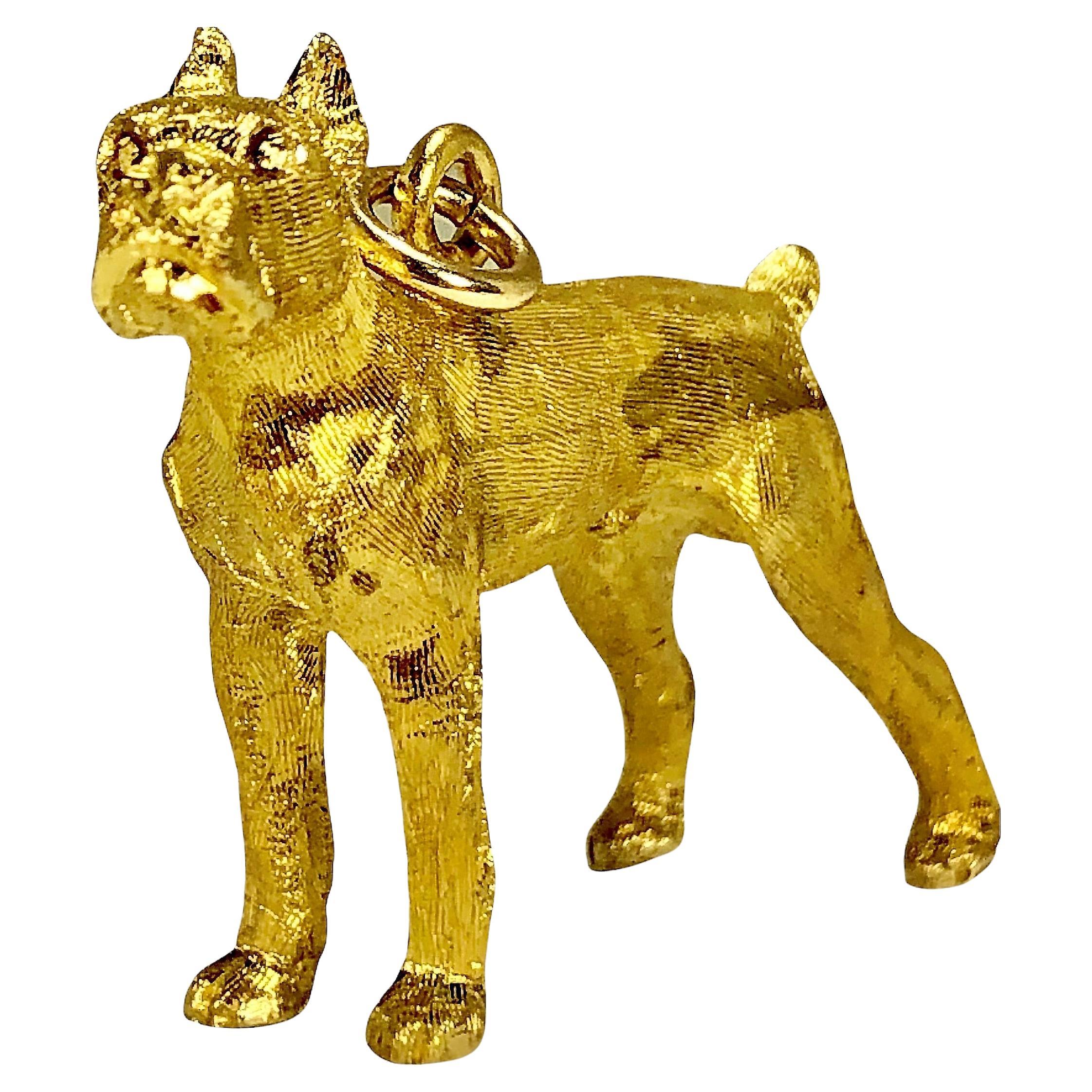 This large 14k gold, three dimensional American Boxer caricature pendant is very lifelike and is substantial; measuring 1 1/2 inches by 1 3/16 inches. The finish is an intricate Florentine which causes light hitting it to shimmer and the entire