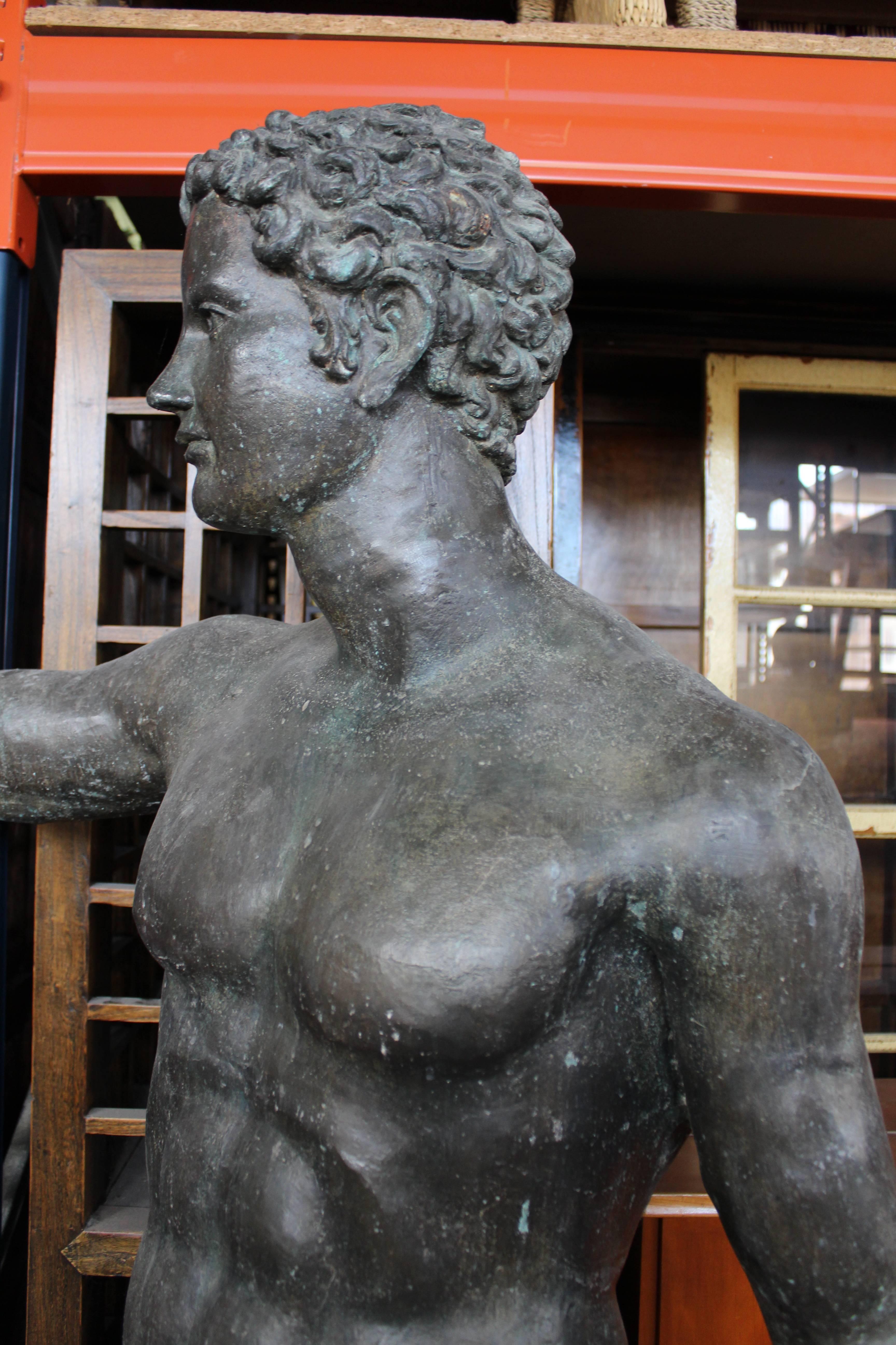 Lifesize bronze sculpture of a Greek athlete cast using the lost wax technique, in Italian antica green patina.