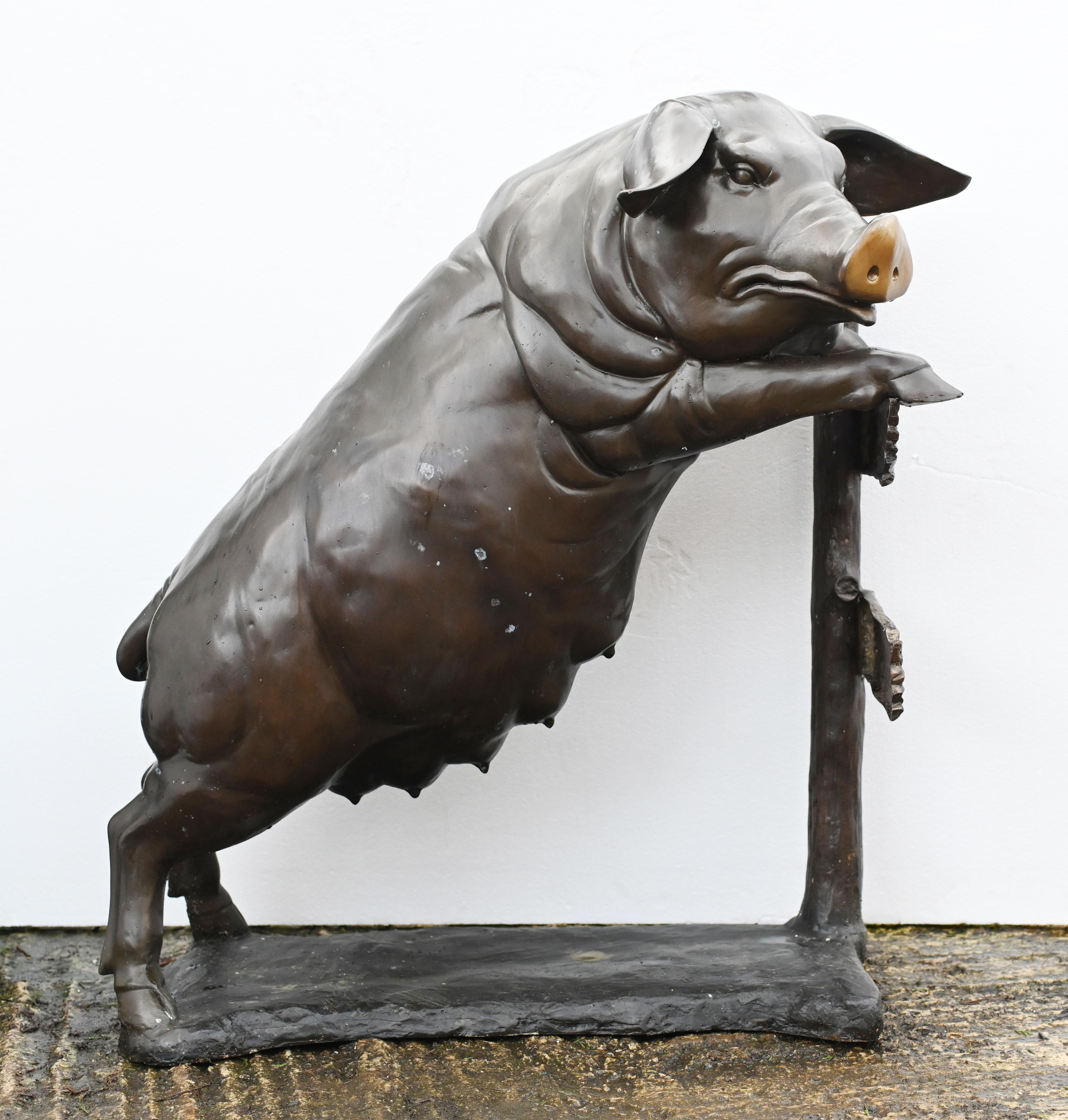 Very quirky lifesize bronze pig statue 
Stands in at over three feet tall - 101 CM
The sow stands on the her hind legs leaning on the fence watching over the garden
The patina to this pig is superb, lovely finish to the bronze
Great collectors piece