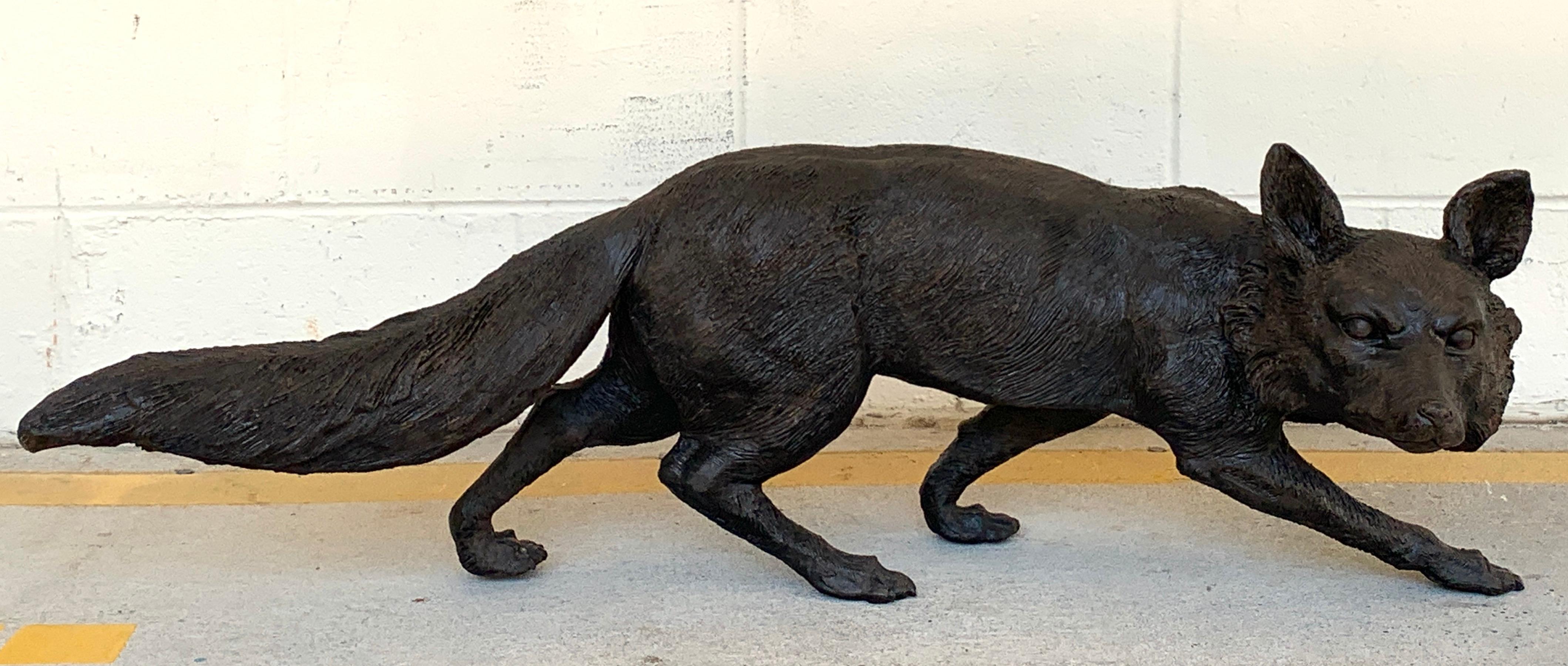 Life-size bronze sculpture of a Walking Fox, Foundry Marked and Artist-signed, Cast in the lost wax process, realistic quality and detail. Can be used indoors or outdoors
Stamped in triangle 