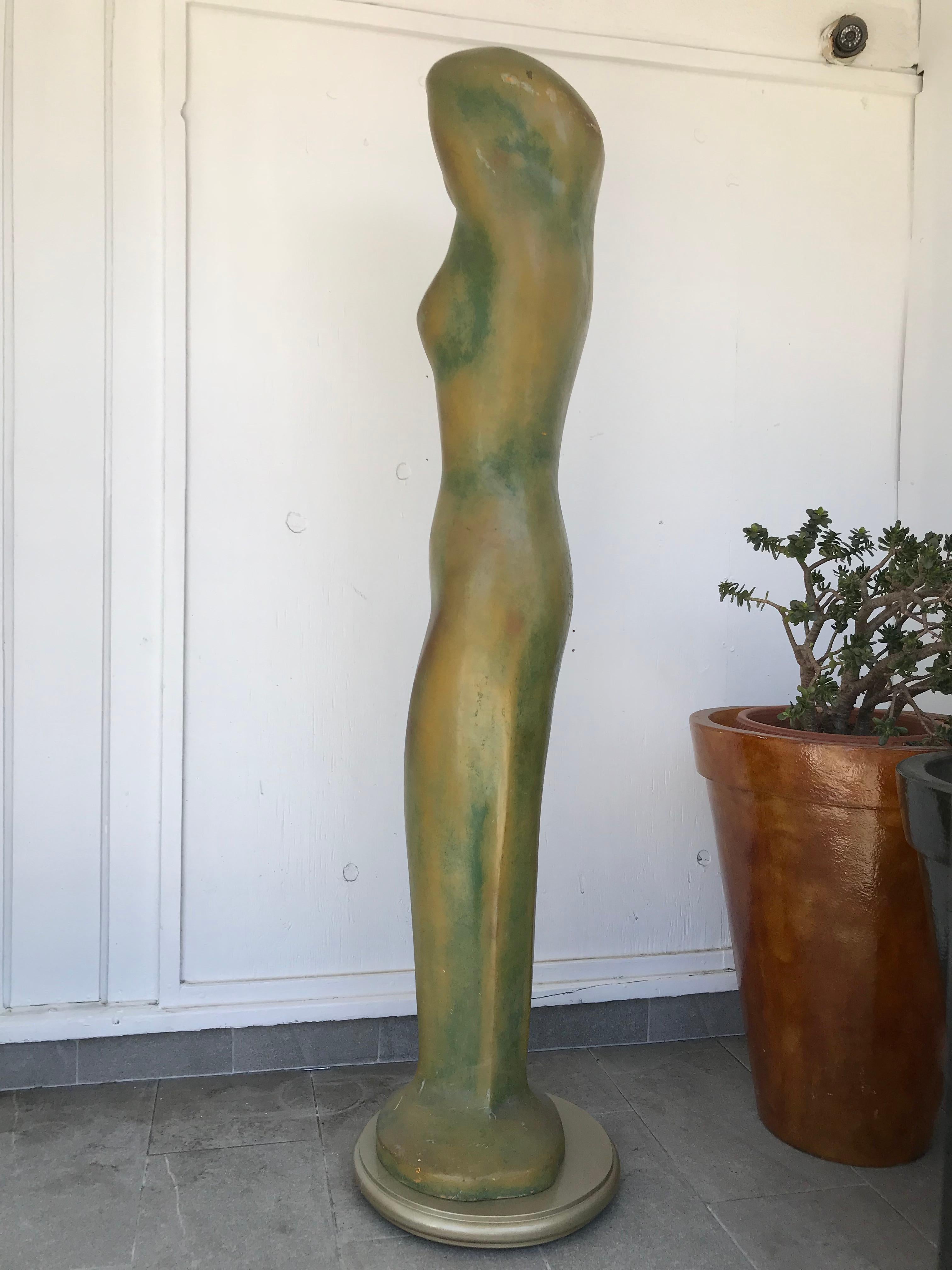 Impressive sinuous sculpture of a woman on a gilded wood base, signed by artist Istvan Toth.
Toth was a Hungarian artist who lived and worked in the Hollywood Hills from the 1960s through the 1990s.
Measures: Height is 73