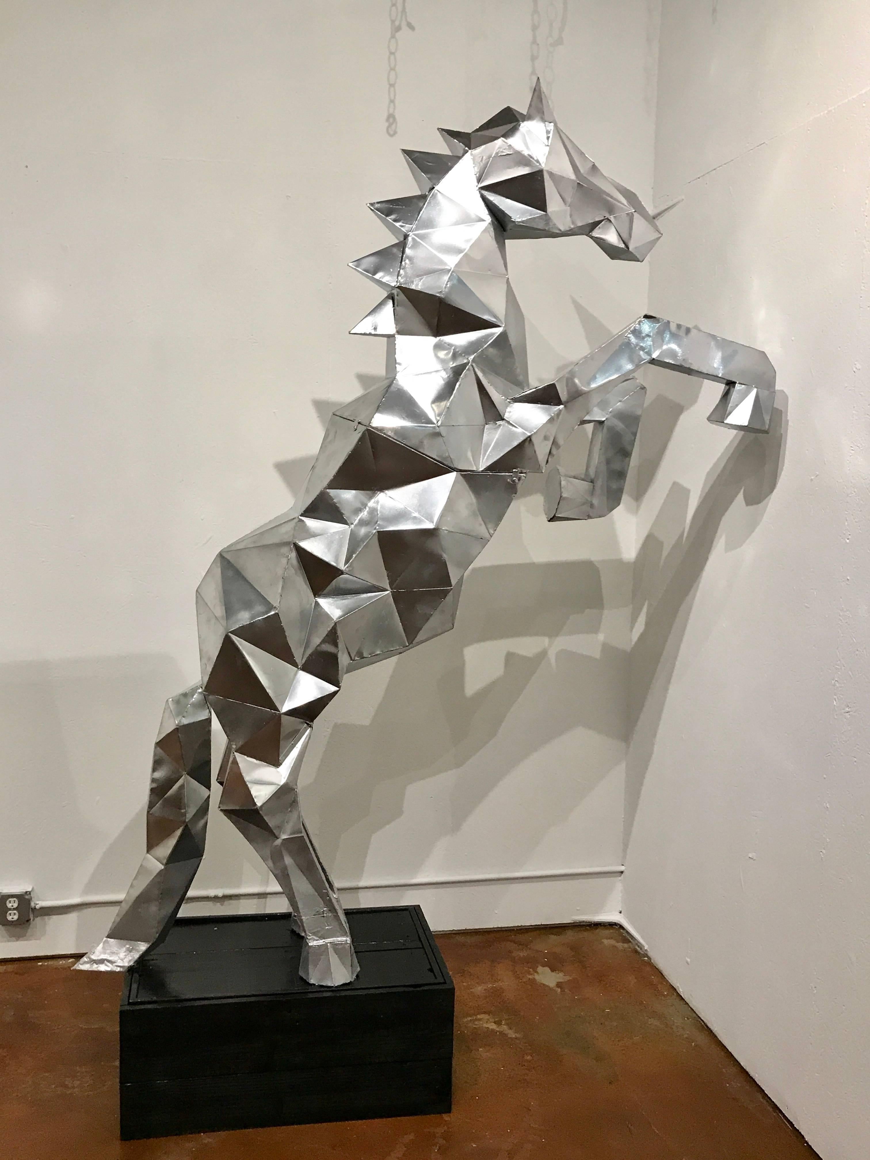 Lifesize Cubist rearing horse or stallion sculpture, in the style of Ben Foster
Sculpted of Ferris Steel, raised on a custom wood plinth, unsigned.
The sculpture stands 8.25 feet high with the pedestal, without the pedestal 7.1 feet high (86