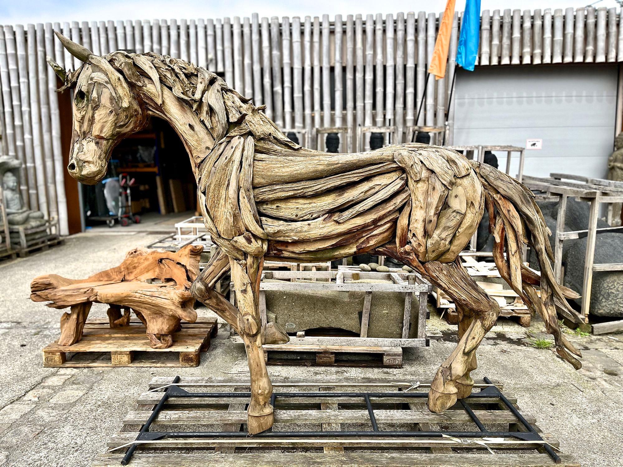 One of a kind lifesize horse sculpture artfully handcrafted by an exceptional indonesian wood artist. Elaborately created out of unique handpicked driftwood pieces that were collected on the beaches of Java, this horse impresses with absolute